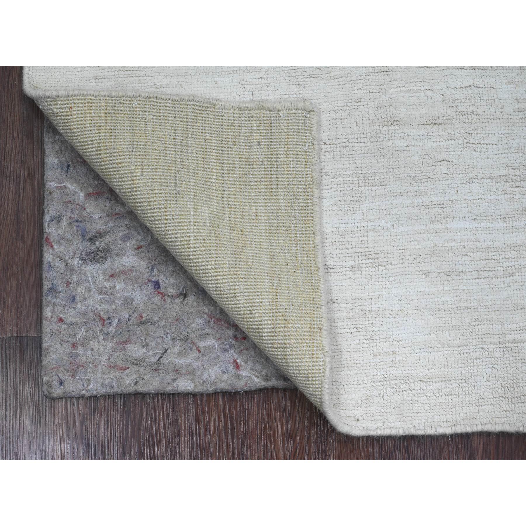 Daisy White, Plain Solid Pattern, Hand Knotted, Hand Spun Ghazni Wool, Lush and Plush, Oriental Rug
Primary materials: Wool
Latex: No Pile 
height: 0.25 Inches
Style: Contemporary
Primary color: Ivory
Secondary colors: None
Pattern: Oriental