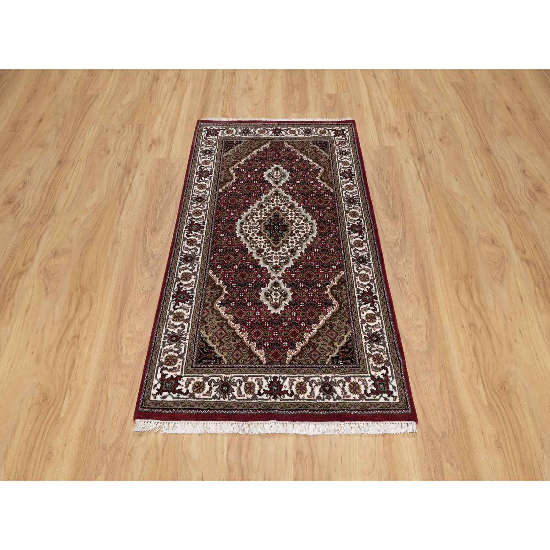 Scarlet Red, Tabriz Mahi with Fish Medallion Design, Organic Wool, Hand Knotted, Densely Woven, Oriental Rug
Primary materials: Wool
Latex: No Pile 
height: 0.25 Inches
Style: Traditional
Primary color: Red
Secondary colors: Gray, Green, Brown,