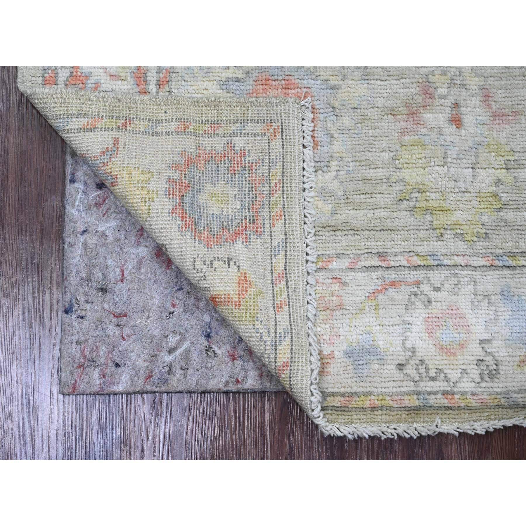 Laurel Green, Hand Knotted, Afghan Angora Oushak with Colorful Leaf Design, Vegetable Dyes, 100% Wool, Runner, Oriental Rug
Primary materials: Wool
Latex: No Pile 
height: 0.25 Inches
Style: Transitional
Primary color: Green
Secondary colors: Red,