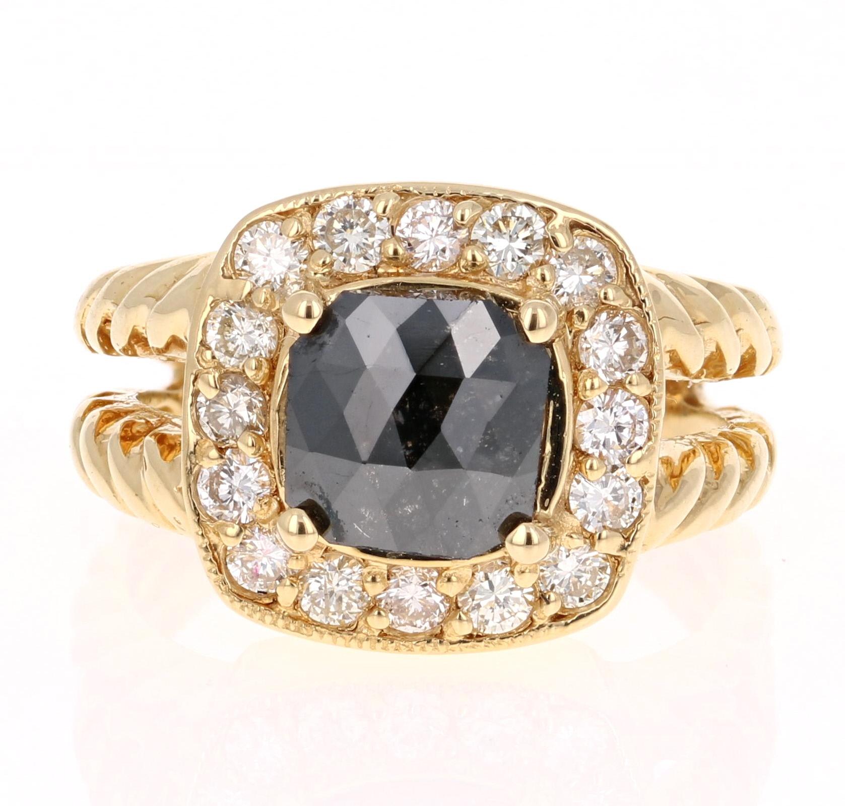 This gorgeous Yellow Gold Black Diamond Bridal Ring has a center Square Cut Black Diamond that weighs 1.47 Carats and has 16 White Round Cut Diamonds weighing 0.64 Carats (Clarity: VS2, Color: H). The total carat weight of the ring is 2.11 Carats.