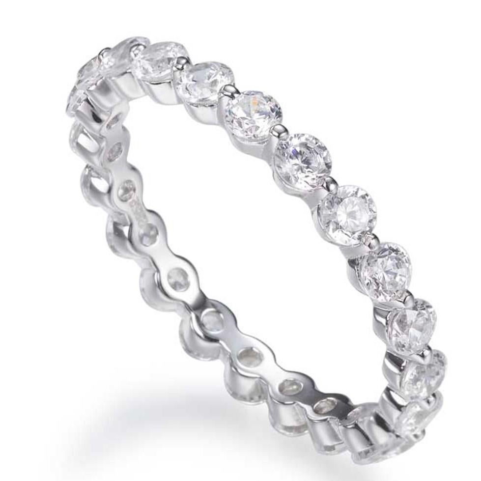 An eternity ring is an unbroken band which symbolises everlasting love.

This elegant example features a full circle of round brilliant cuts totalling 2.11ct.

Composed of 925 sterling silver with a high gloss white rhodium finish.

Whether you're
