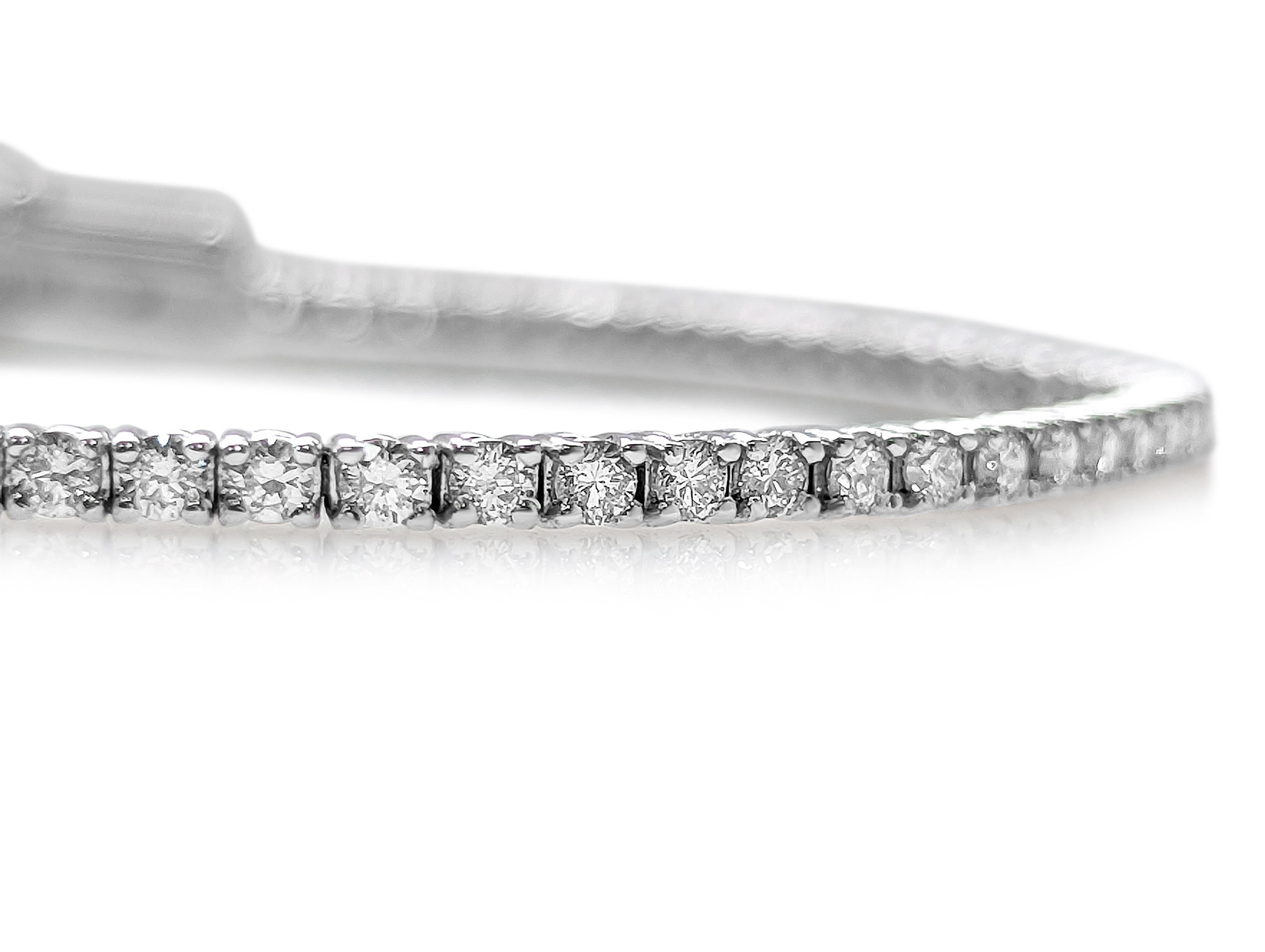 Exclusive diamond tennis bracelet of top quality, D-F color and VS1-VS2 clarity.

Side Stones:
___________
Natural Diamonds
Cut: Round Brilliant
Carat: 2.11 cttw / 82 stones
Color: D-F
Clarity: VS1-VS2

Item ships from Israeli Diamonds Exchange,