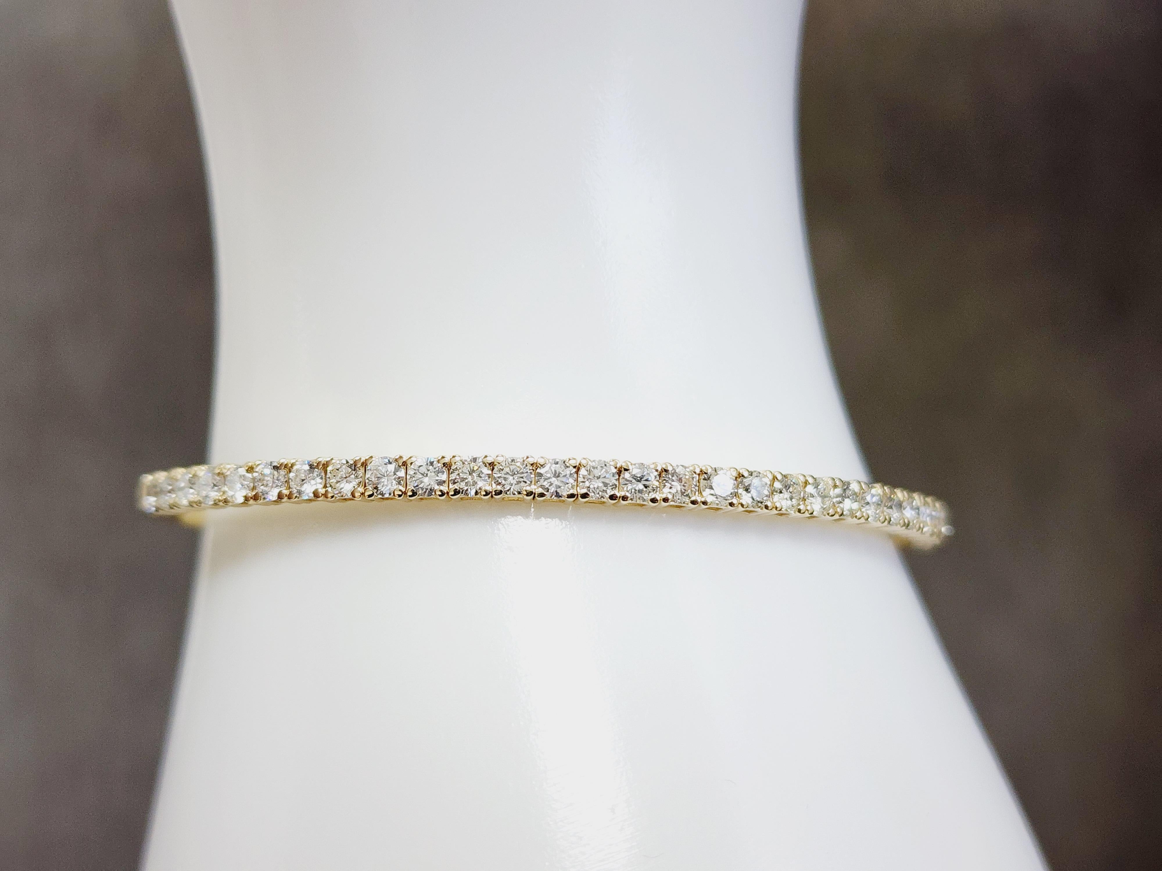 Natürliche Diamanten 2,11 ctw flexible Armreif Gelbgold 14k 7 Zoll. Durchschnittliche Farbe H Klarheit VS. 2,9 mm breit.