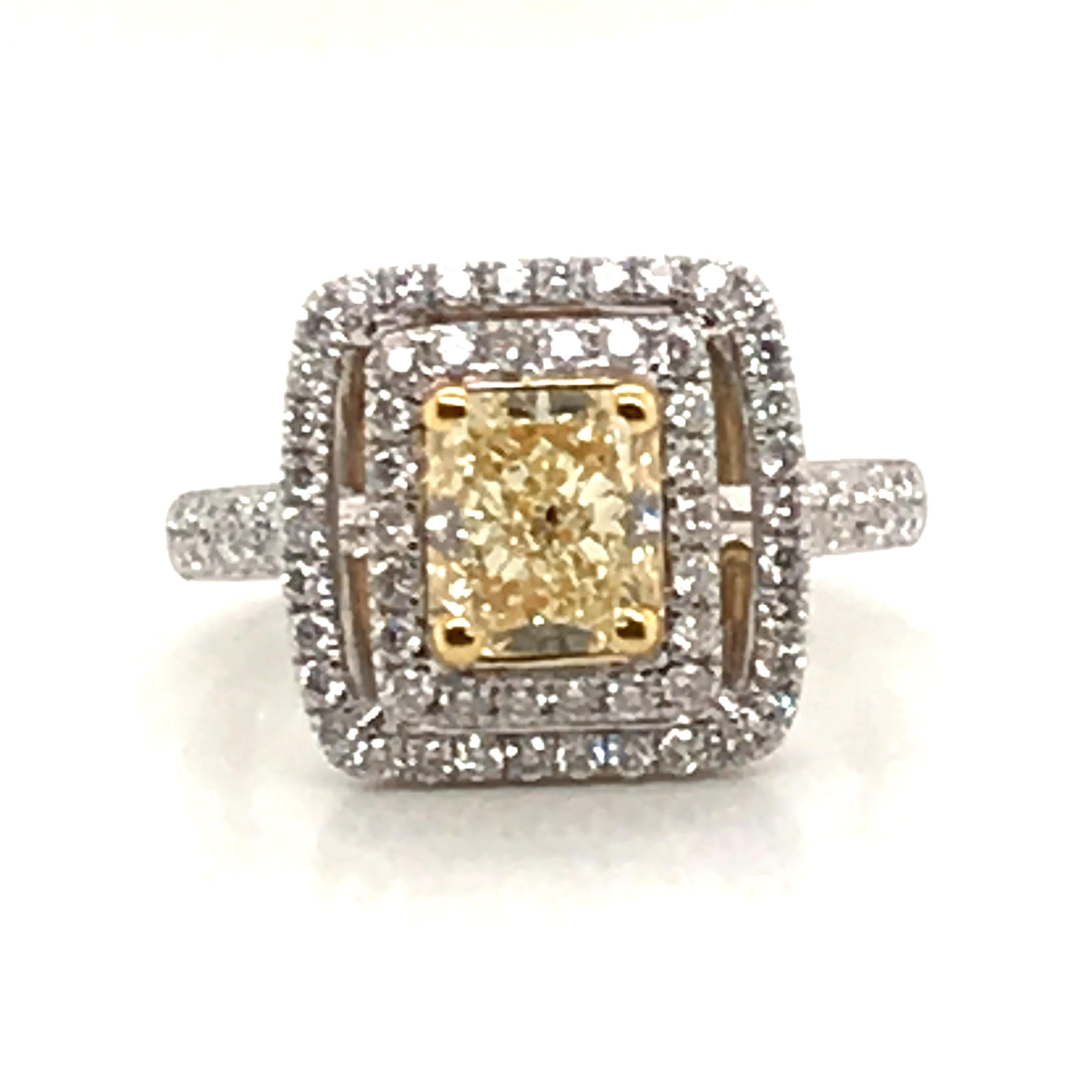 HJN Inc. Ring featuring a 2.11 Carat Natural Fancy Yellow Diamond Ring with 18K White and Yellow Gold

Natural Fancy Yellow Diamond: 1.51 Carats
Round-Cut Diamond Weight: 0.60 Carats

Total Stones: 80
Clarity Grade: SI1
Color Grade: H
Total Diamond