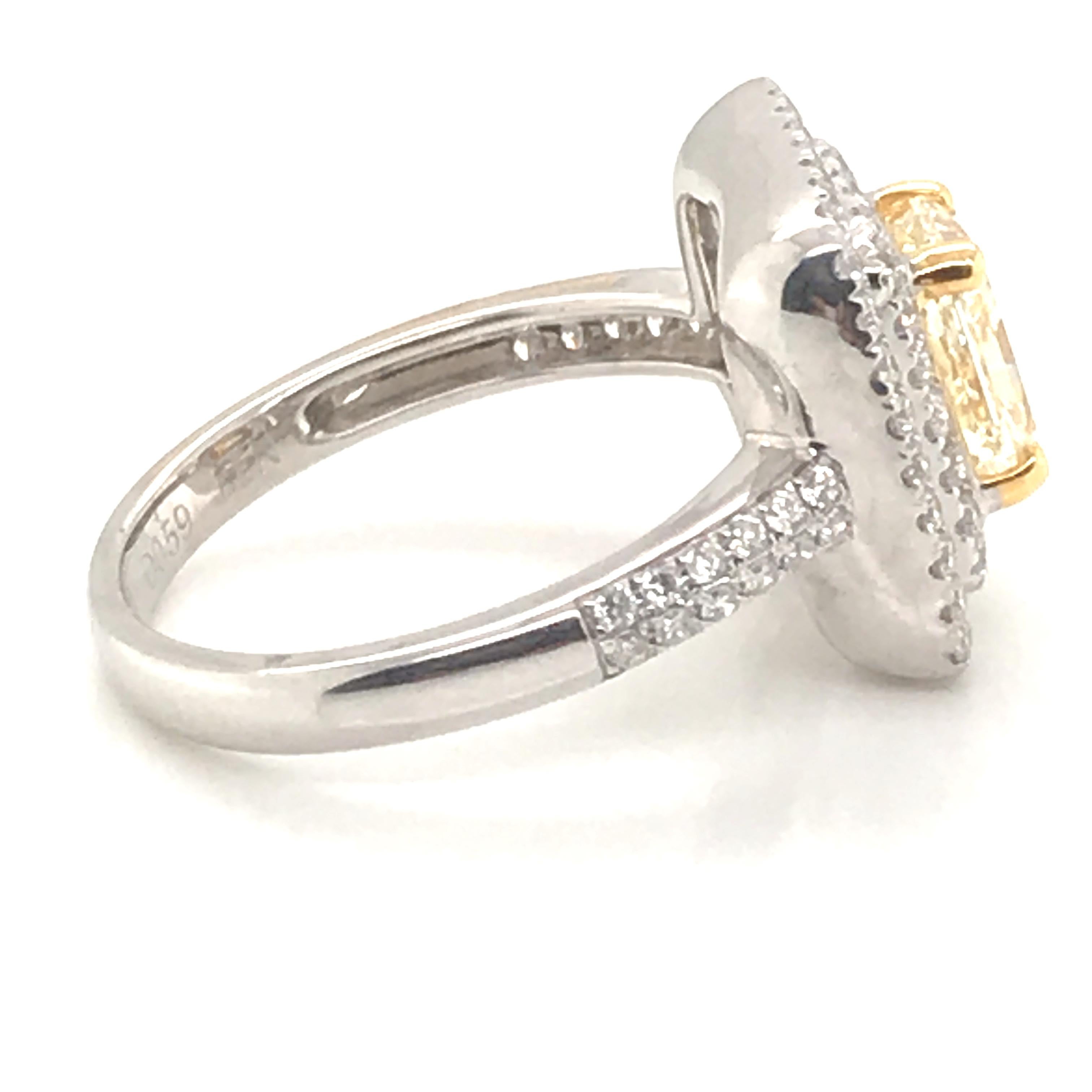 Round Cut 2.11 Carat Natural Fancy Yellow Diamond Ring with 18 Karat White and Yellow Gold For Sale