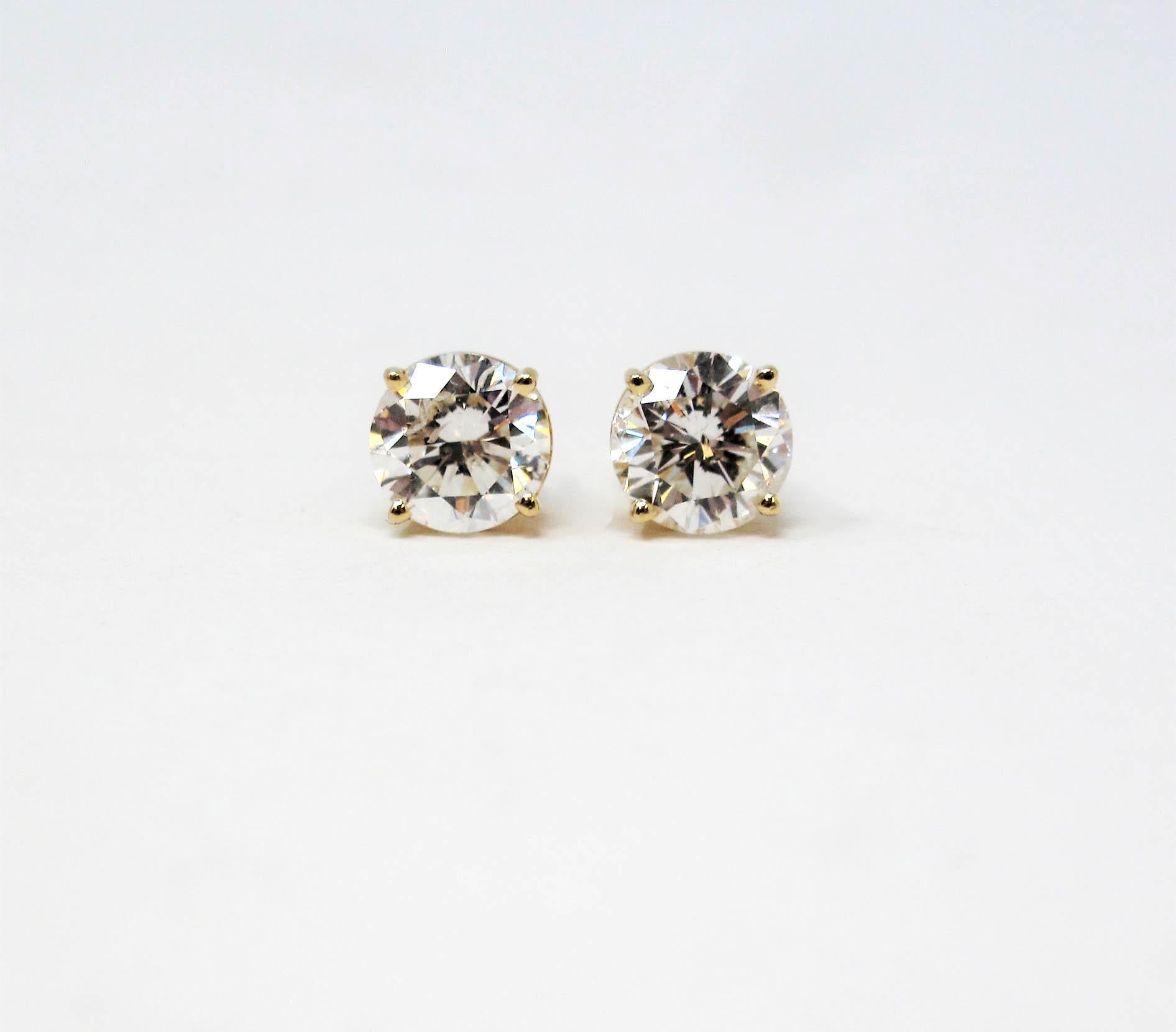 Meet your new go-to earring! These incredible, timeless diamond solitaire stud earrings are the absolute epitome of understated elegance. Classic in style, generous in size and bursting with sparkle, these earrings will truly stand the test of time.