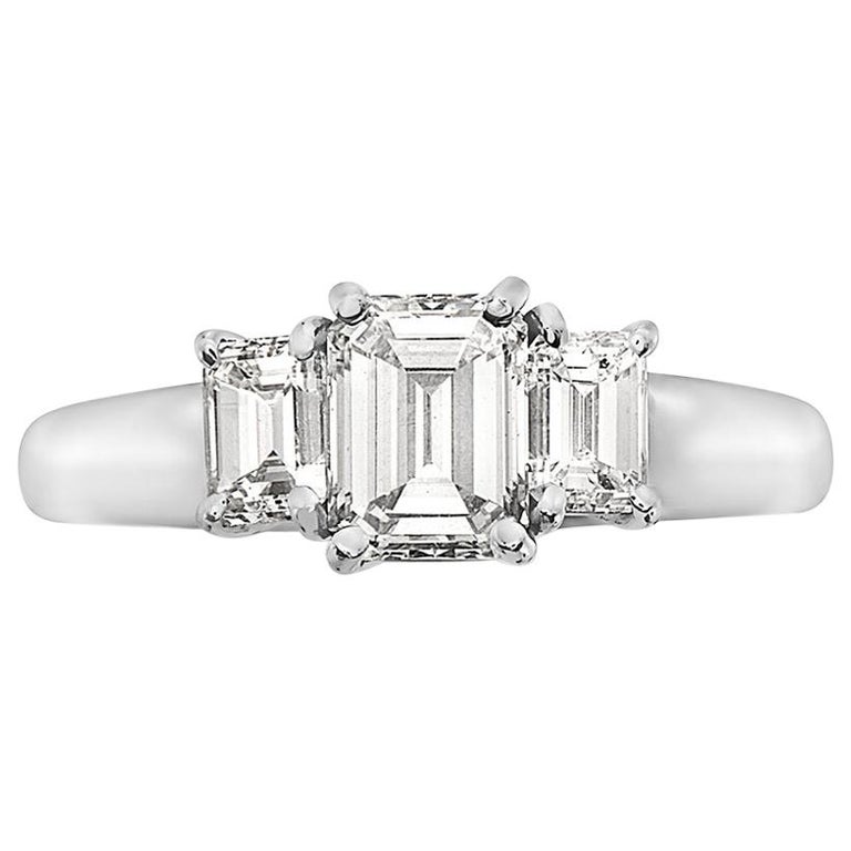 2.11 Carat Trilogy Platinum Emerald Cut Engagement Ring For Sale at