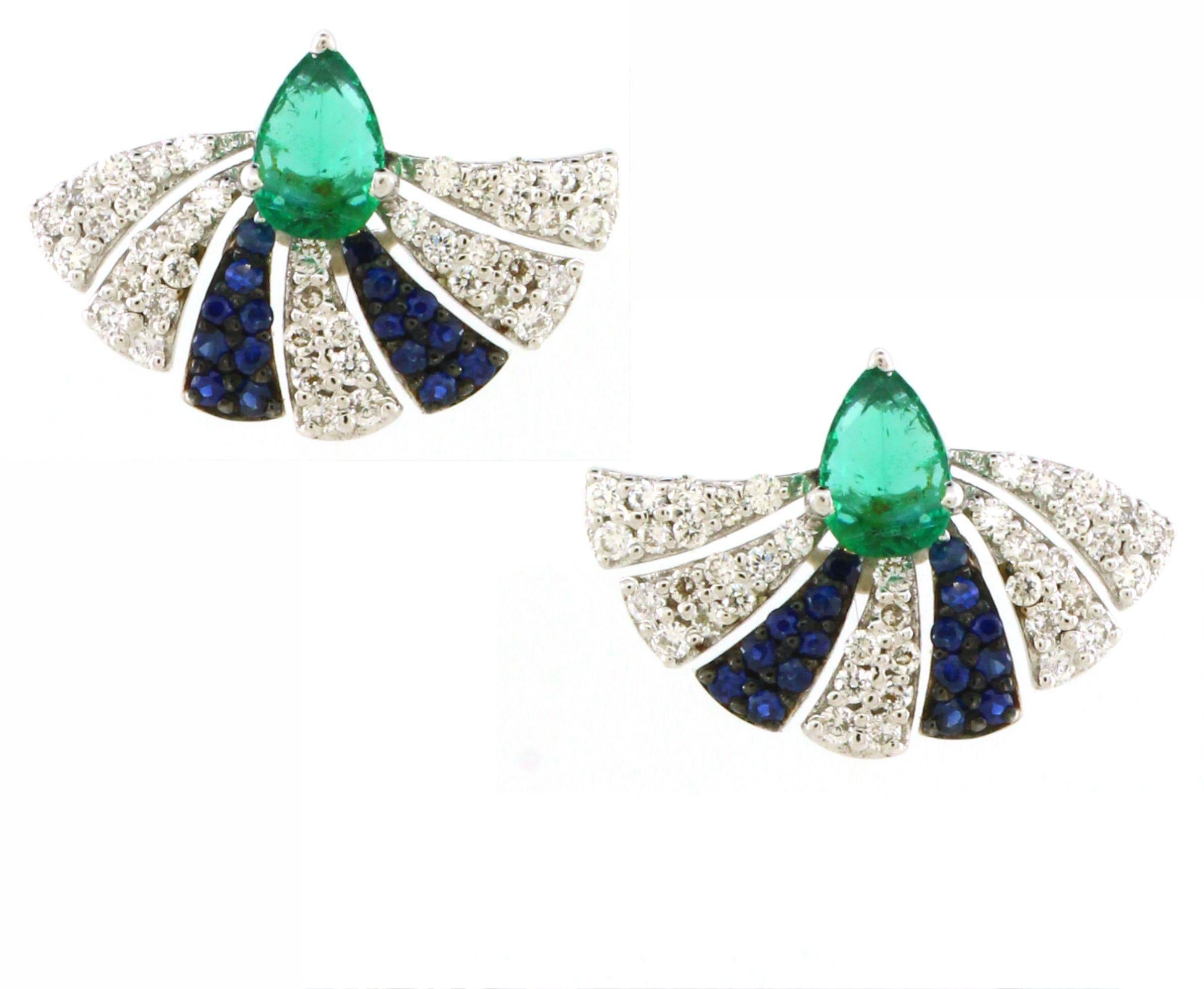 Ispirato all'eleganza dei ventagli giapponesi, questo set di pendenti emana un fascino raffinato e artistico. La parure comprende un paio di orecchini e un ciondolo abbinato, tutti realizzati in oro bianco 14 carati con un peso totale di 7,98