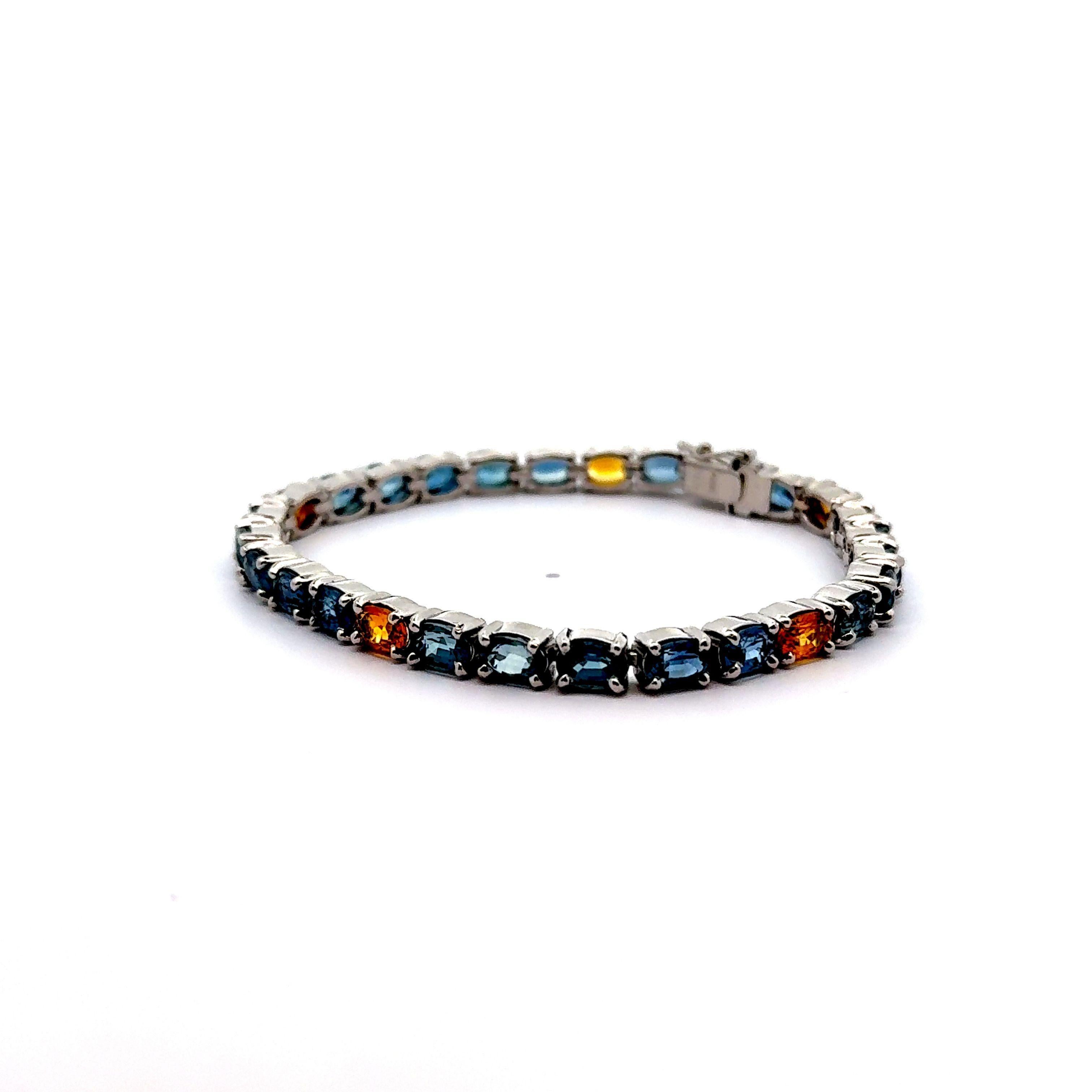 Oval Cut 21.10 Carat Blue & Yellow Sapphire Platinum Tennis Bracelet For Sale