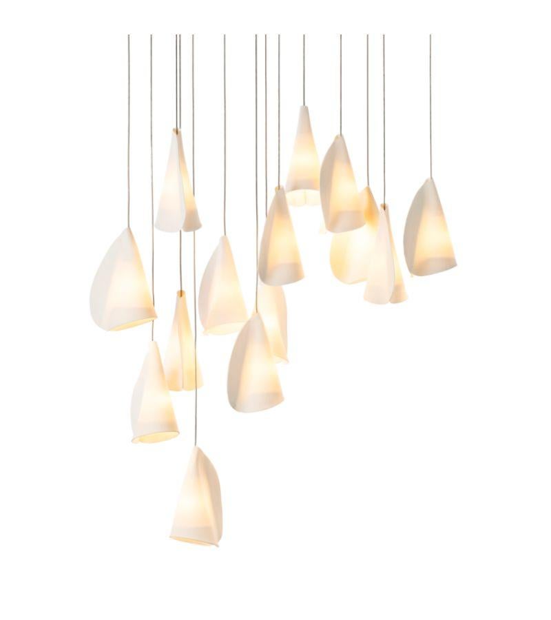 21.14 Porcelain chandelier lamp by Bocci
Dimensions: 
Round canopy: diameter 50.8 x height 300 cm 
Rectangular canopy: D 28.4 x W 85 x H 300 cm 
Materials: Porcelain, borosilicate glass, braided metal coaxial cable, electrical components,