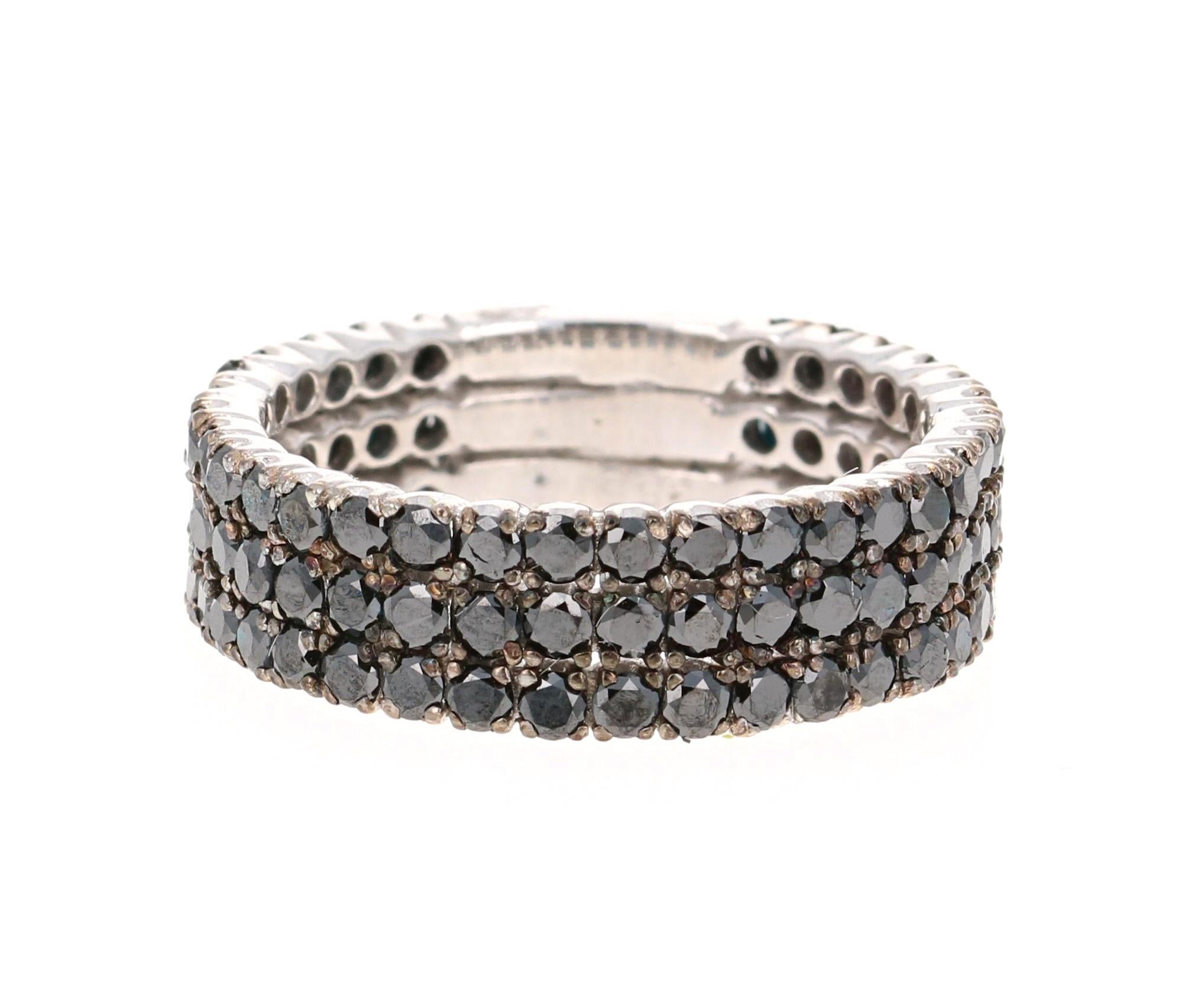 Simple yet Elegant.....This classic design is going to compliment almost anything in your wardrobe!   This band gives the illusion that you are wearing 3 separate bands but is actually just 1 band.  There are a total of 90 Round Cut Black Diamonds