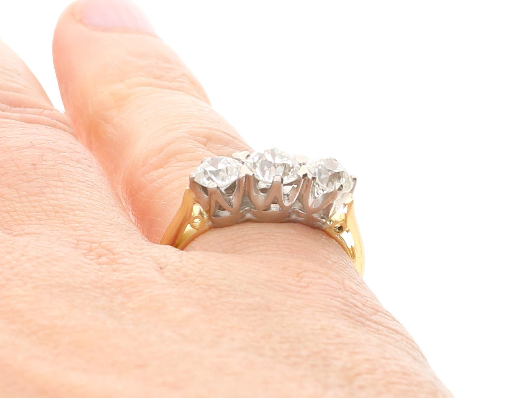 2.12 Carat Diamond and Yellow Gold Three-Stone Ring 4