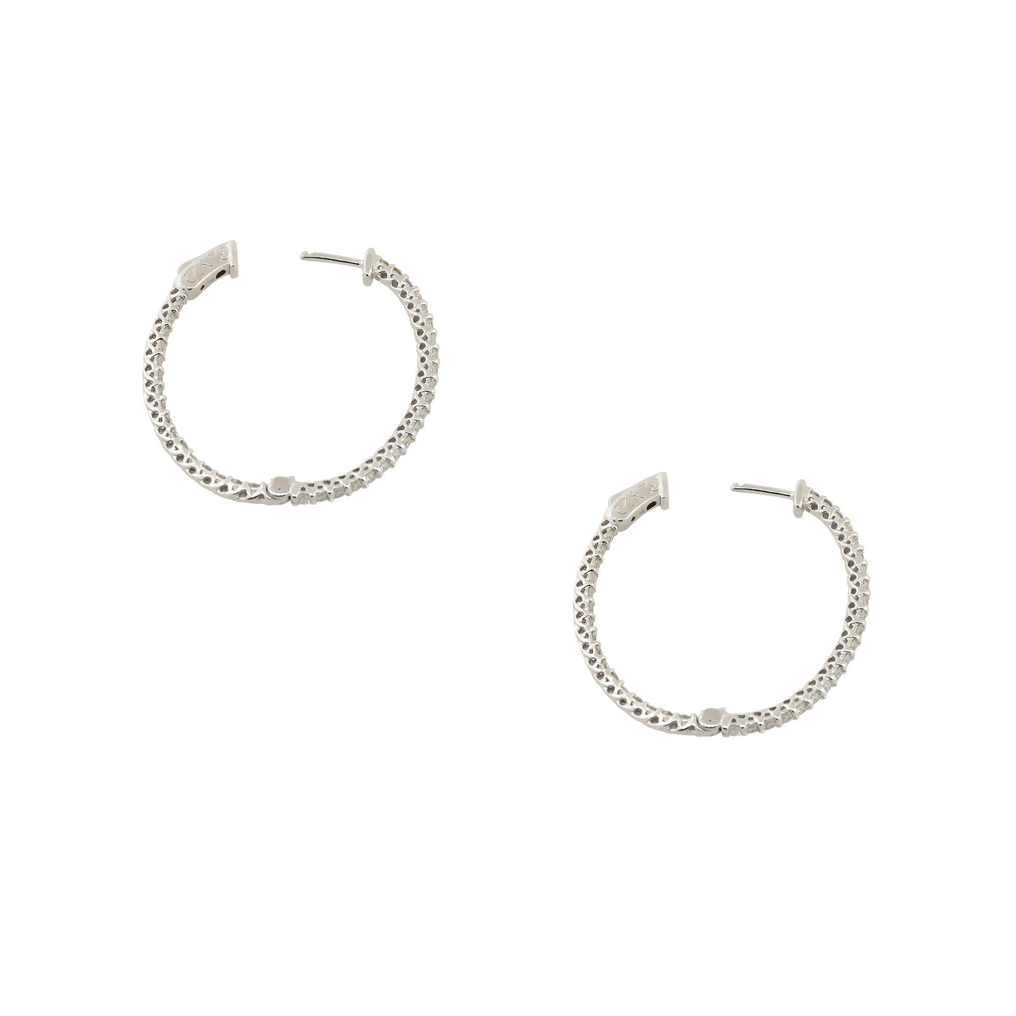 14k White Gold 2.12ctw Diamond Inside-Out Oval Hoop Earrings

Style: Oval Shaped Inside Out Hoop Earrings
Material: 14k White Gold
Diamond Details: Approximately 2.12ctw of Round Brilliant Cut Diamonds. Diamonds are set inside-out of the
