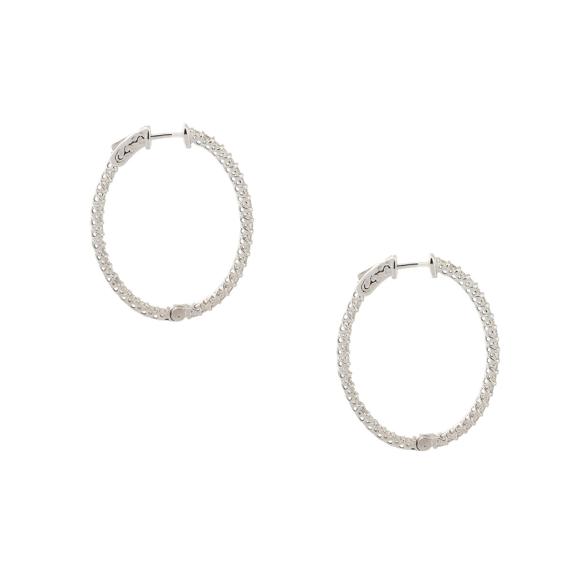 Modern 2.12 Carat Diamond Inside-Out Oval Hoop Earrings 14 Karat In Stock For Sale