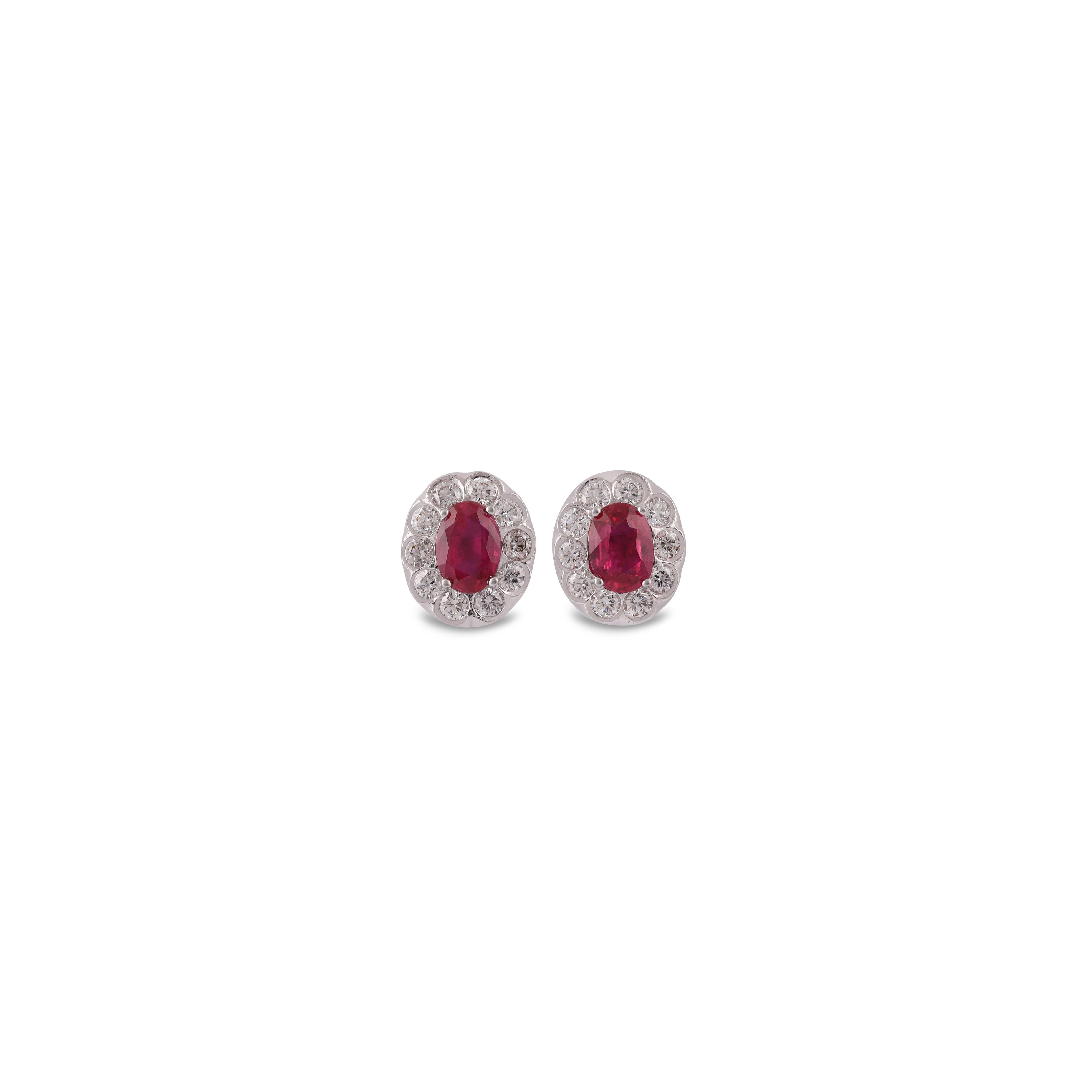 A stunning, fine and impressive pair of  2.12 carat Natural Mozambique Ruby & 1 Carat  Diamond with Solid 18k White Gold. 

Studs create a subtle beauty while showcasing the colors of the natural precious gemstones and illuminating diamonds making a