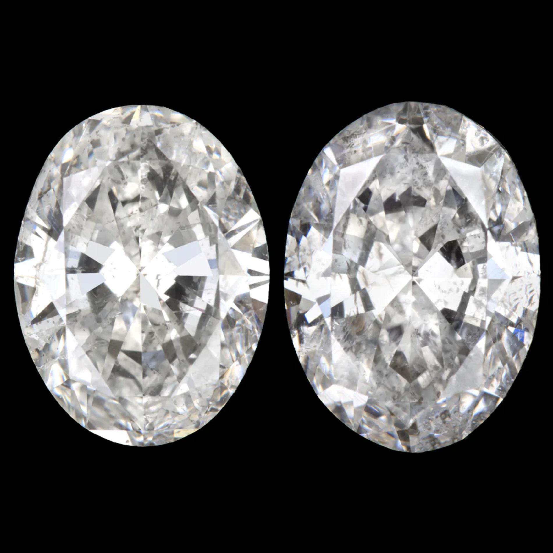 Modern 2.12 Carat Oval Diamond Halo Platinum Earrings For Sale