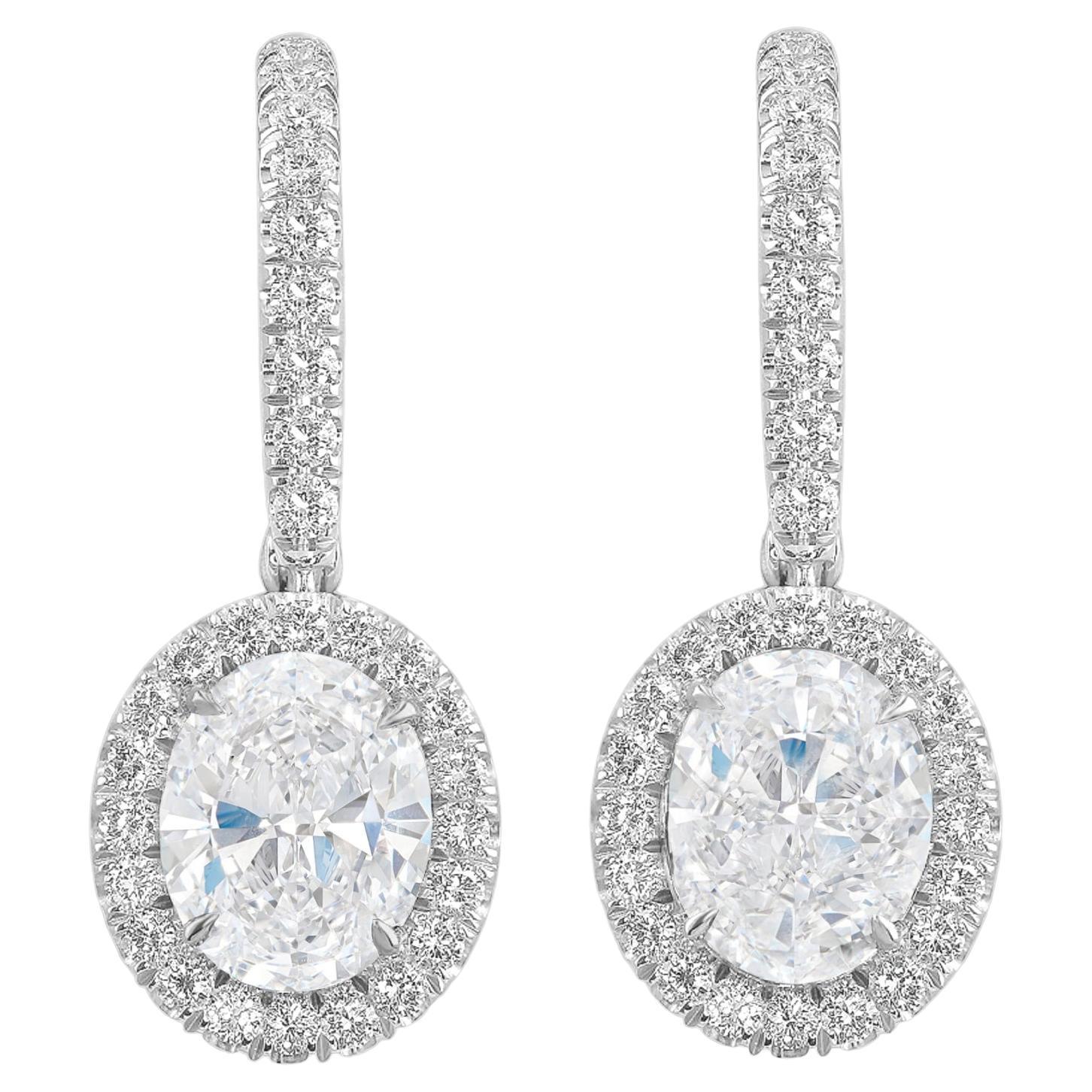 2.12 Carat Oval Diamond Halo Platinum Earrings For Sale