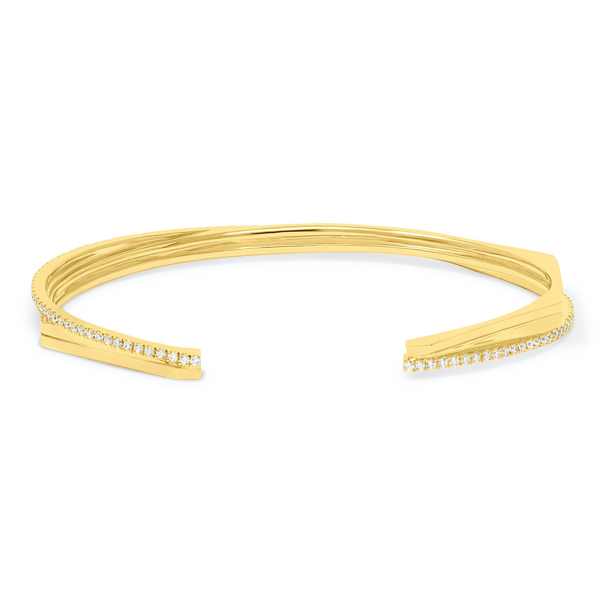  Halo Bangle in 18k yellow gold with 2.12ct of white diamonds pave inspired by galaxy, physics and geometry. The earth-orbiting moon inspires the asymmetrical line of pave diamonds, representing love and guardianship.

Diamond Information:
Type: