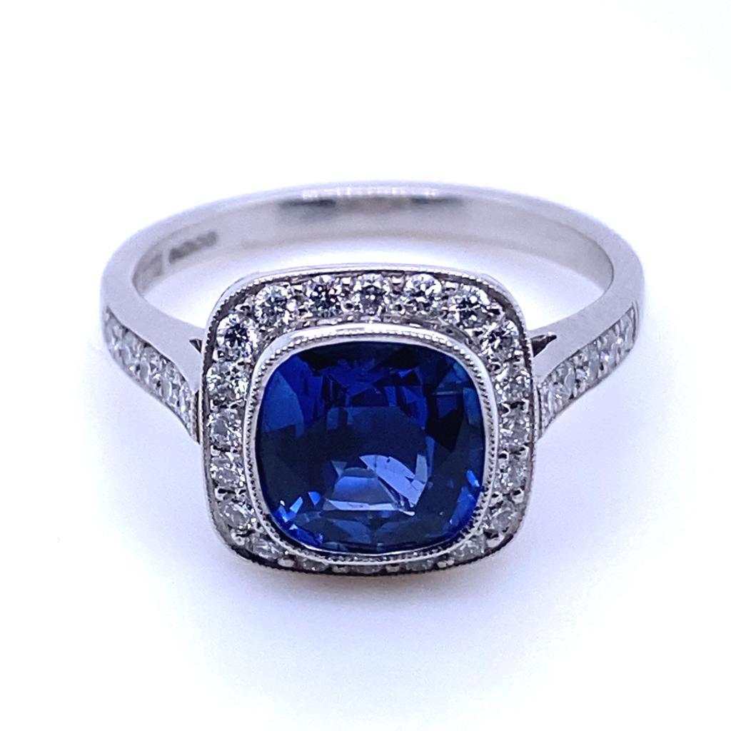 Modern 2.12 Carat Sapphire and Diamond Cluster Platinum Engagement Ring For Sale