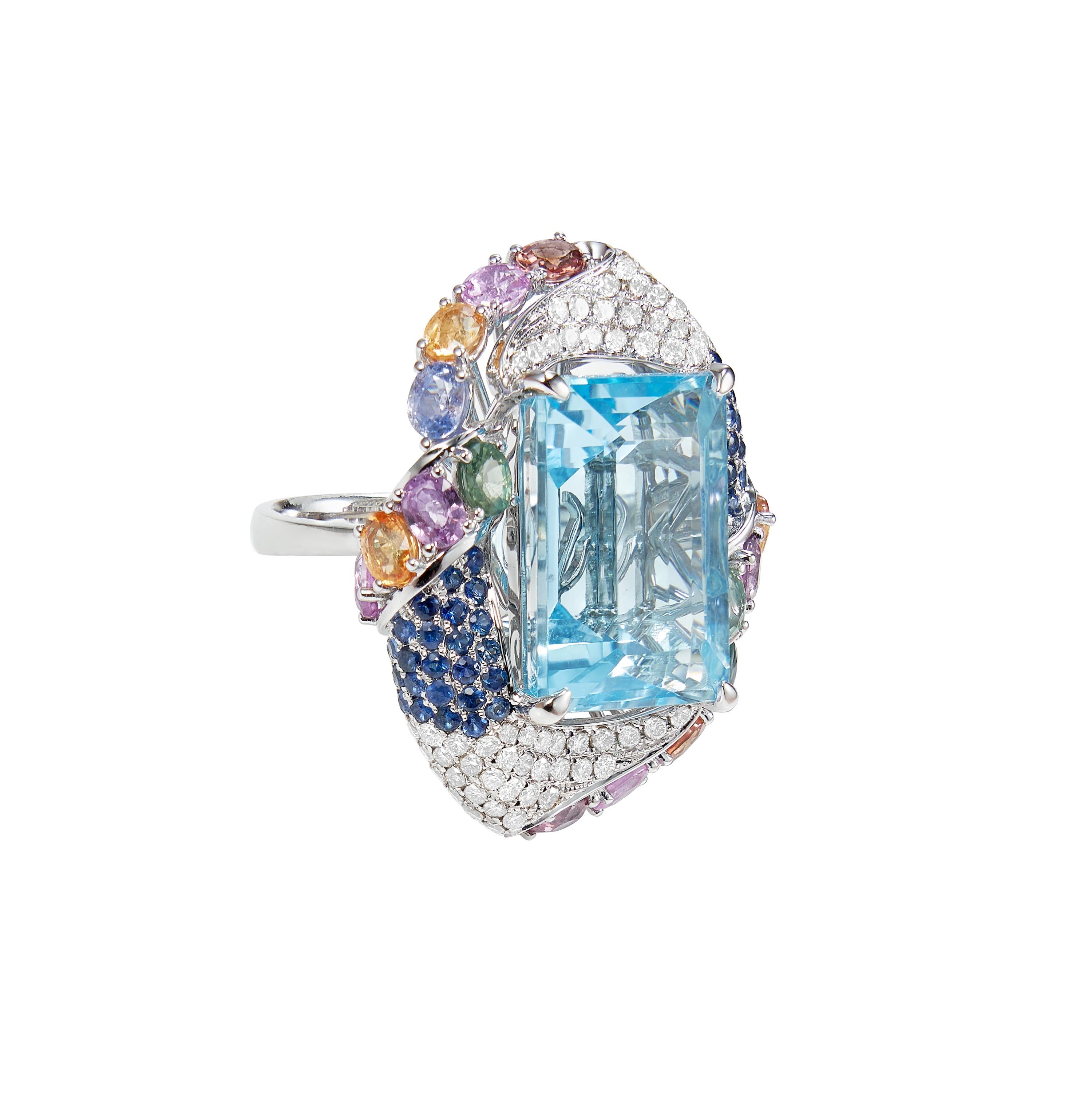 Sunita Nahata presents a collection of bold and colorful cocktail rings. This ring features a top mesmerizing sky blue topaz at the center, with blue sapphire, multi sapphires and diamonds radiating out onto the shrank of the ring.  

Sky Blue Topaz