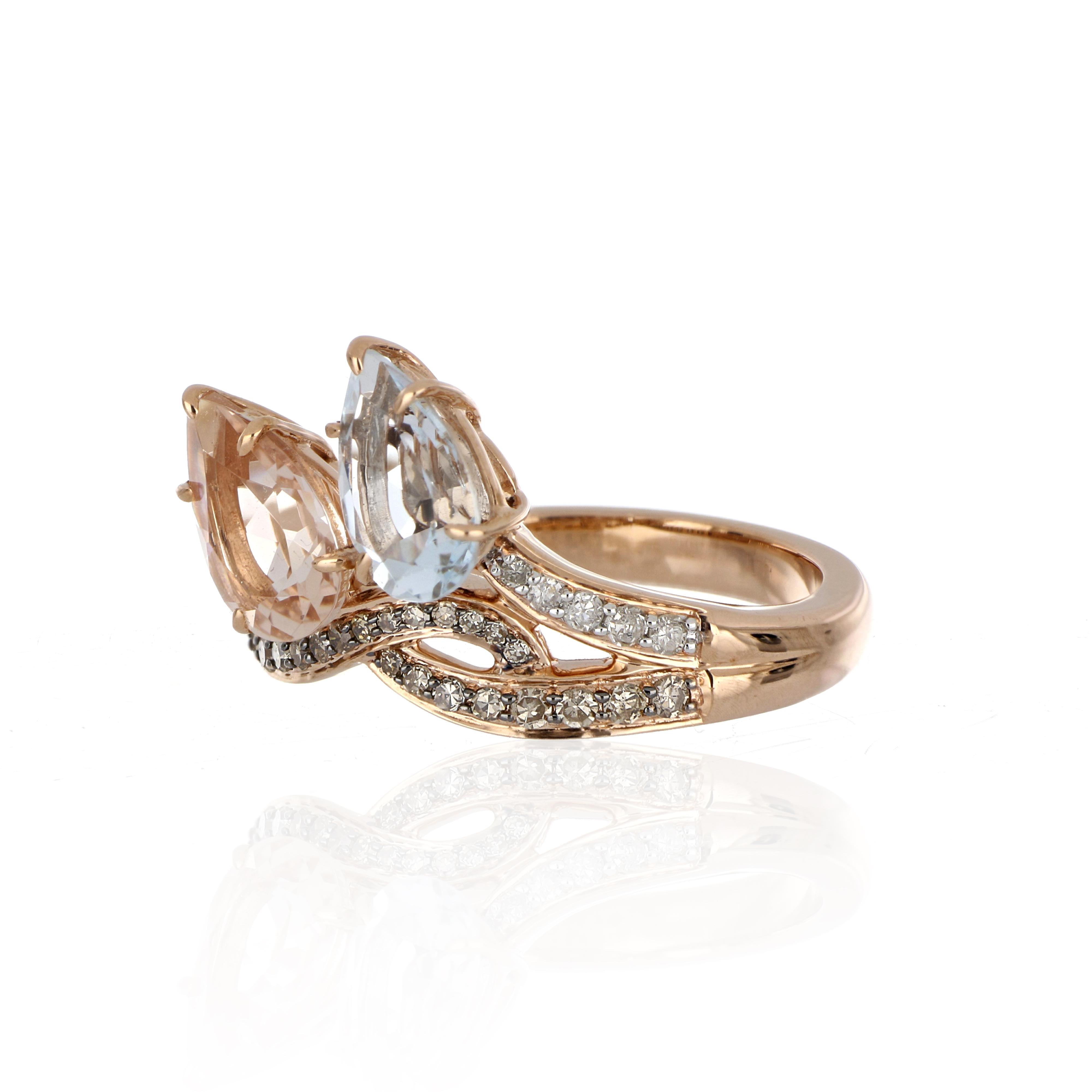 Elegant and Exquisitely detailed Cocktail Ring, set with 1.11 Ct Pear Cut Aquamarine, 1.01 Ct Pear Cut  Morganite, accented with micro pave Chocolate (Brown) and White Diamonds weighing approx. 0.22 Cts. total carat weight.  Beautifully Hand crafted