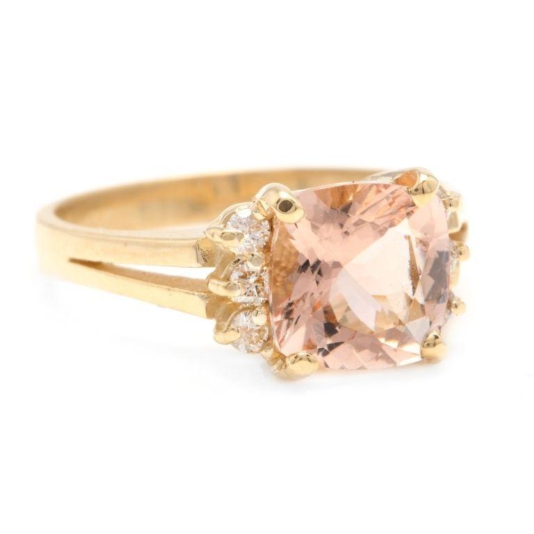 2.12 Carats Impressive Natural Morganite and Diamond 14K Solid Yellow Gold Ring

Total Morganite Weight is: Approx. 2.00 Carats

Morganite Treatment: Heating

Morganite Measures: Approx. 8.00 x 8.00mm

Natural Round Diamonds Weight: Approx. 0.12