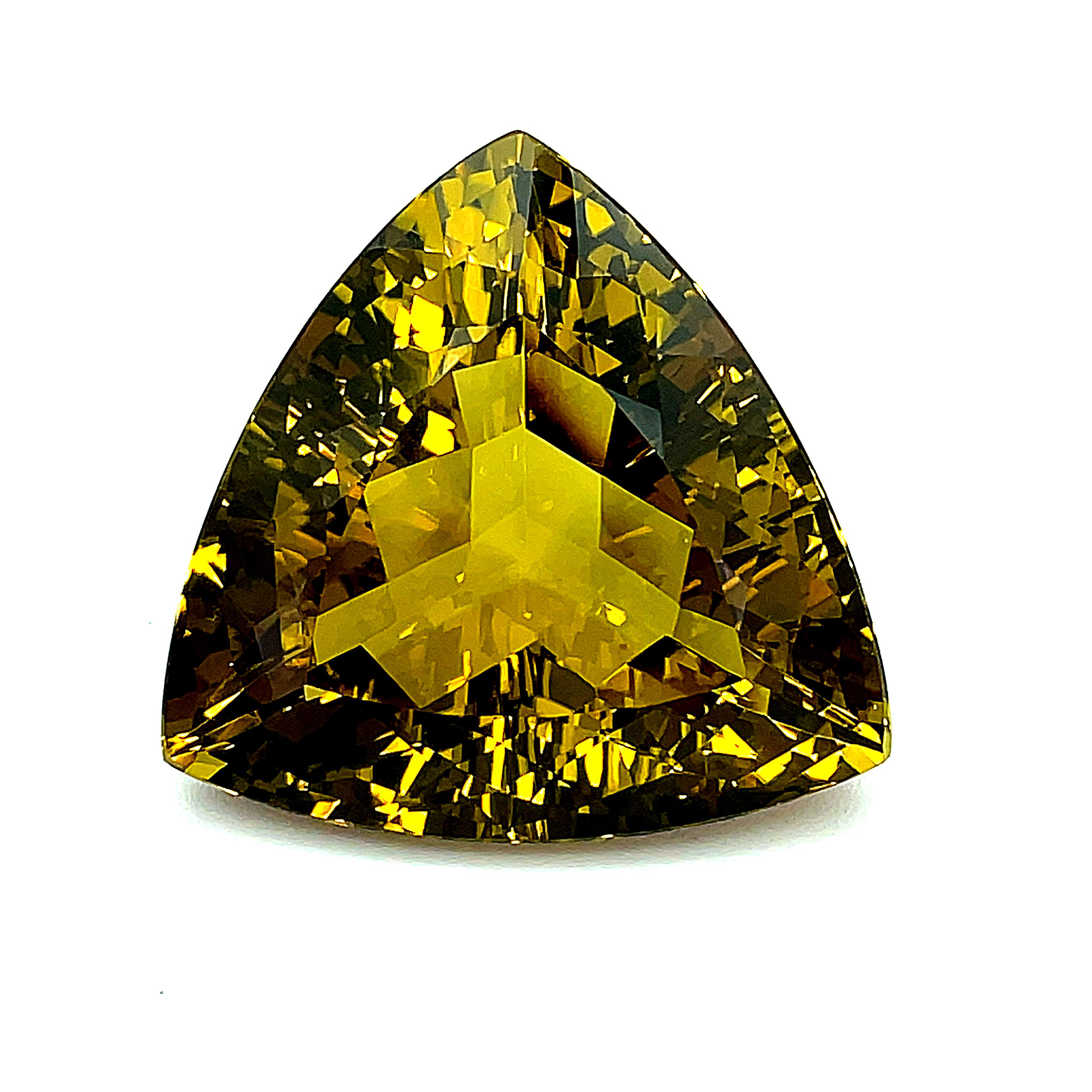 This beautifully faceted golden citron quartz weighs 212.14 carats and is stunningly brilliant! Evenly proportioned and full of life, this would make an impressive display piece whether on a desk or in a crystal cabinet! Golden lemon highlights