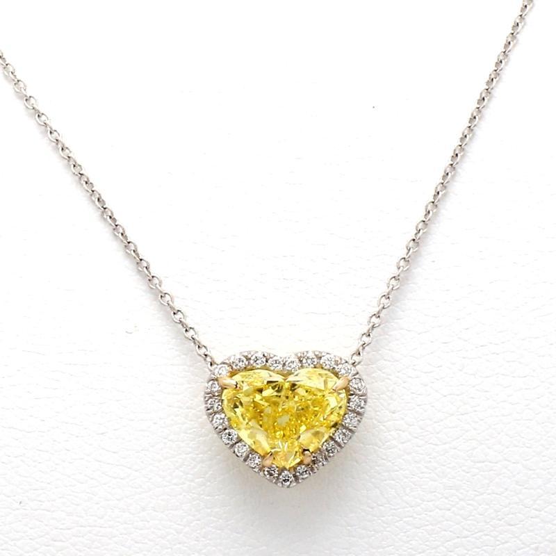 For sale is a lady's platinum and 18K yellow gold 2.12ct Fancy Vivid Yellow GIA Certified Heart shaped diamond necklace accented with 0.11 carats of round diamonds. 

CENTER STONE: 2.12ct FYV SI1 Heart Shaped Diamond

ACCENT/SIDE STONES: 23 Round