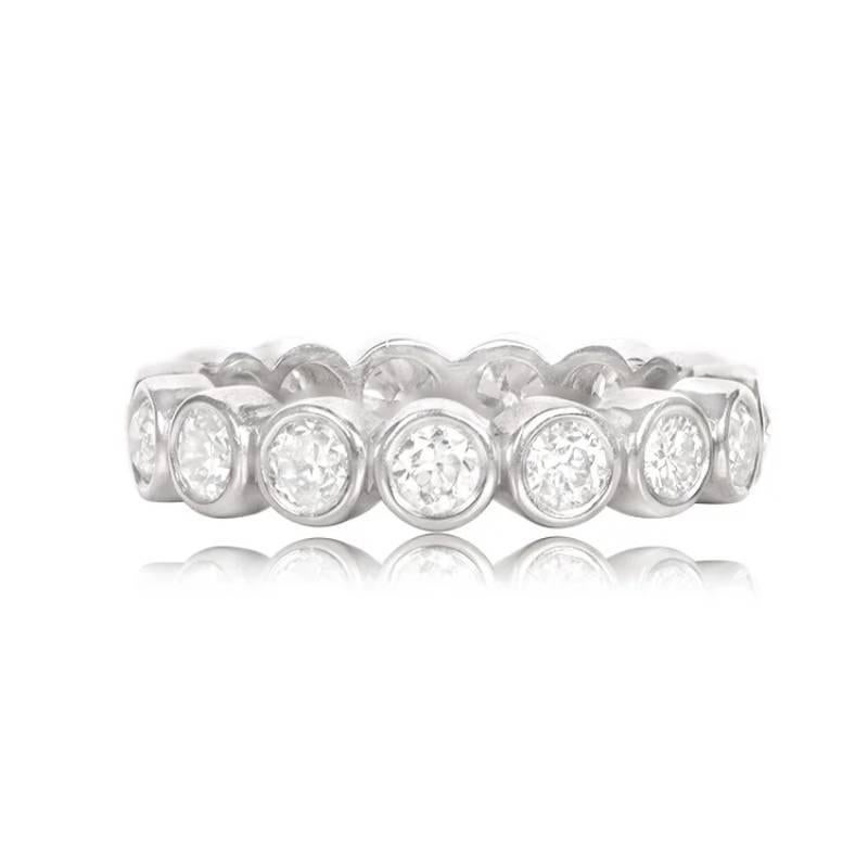 Experience elegance with this stunning eternity band, showcasing bezel-set old European cut diamonds totaling approximately 2.12 carats. The band, crafted in platinum, boasts a width of 4.4mm, offering a timeless and sophisticated allure.

The