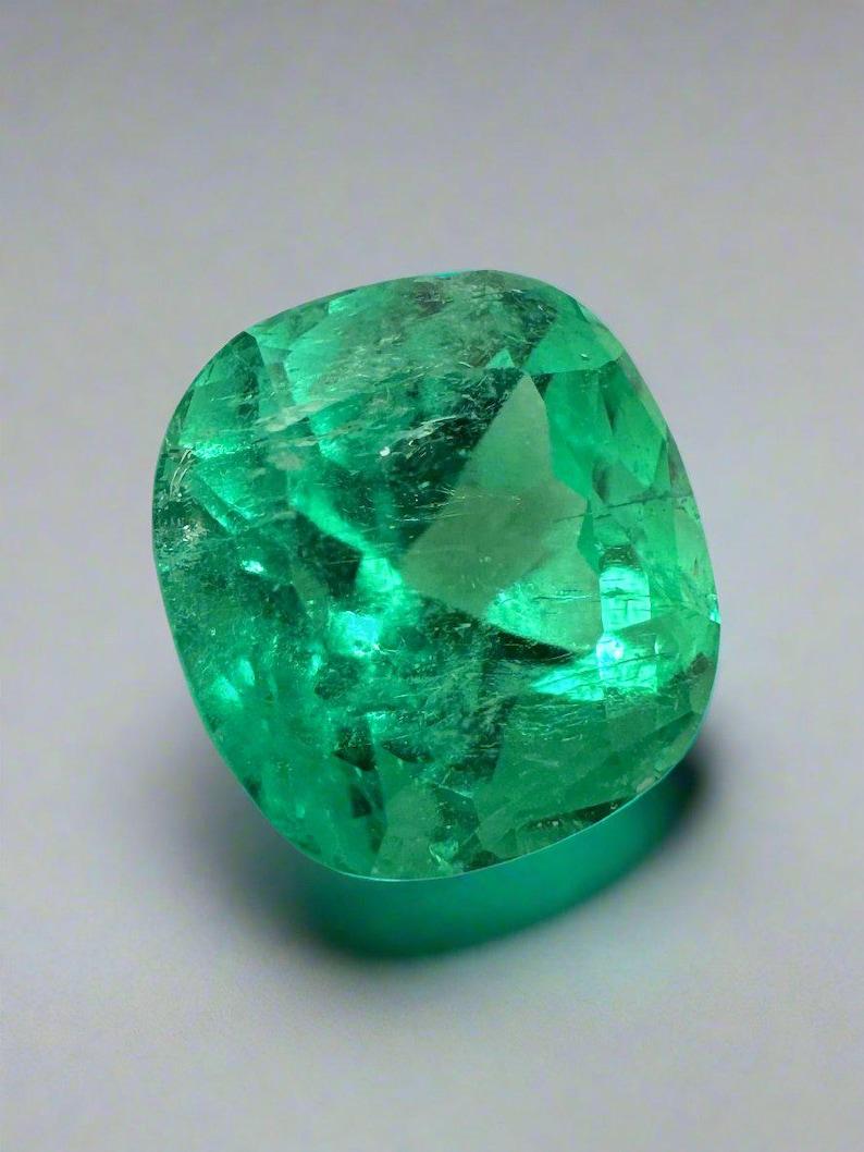 Stone: Emerald
Weight: 2.13-carats
Shape: Cushion Cut
Clarity: Transparent
Luster: Excellent
Color: Muzo Green
Measurements: 8.05mm x 7.56mm x 6.26mm
Geographic Origin: Colombia
Treatment: Natural, Oiling

Comments: Due to their growth conditions in
