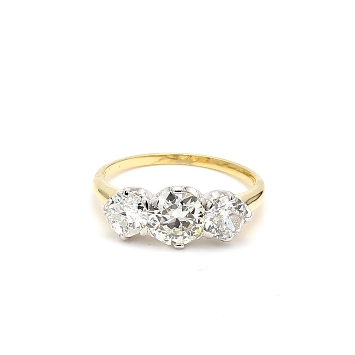 Title:
2.13 Carat Old European Cut SI2 and Circular Brilliant Cut M VS1 Diamond 18 Karat Two Tone Gold/Platinum Three-Stone Ring


Style:
Three-Stone


Metal:
18 Karat Two Tone Gold/Plat


Gemstone 1:
0.99 Carat Diamond


Number of