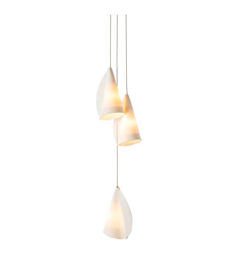 21.3 Cluster porcelain chandelier Lamp by Bocci.
Dimensions: diameter 15.2 x height 300 cm.
Materials: Porcelain, borosilicate glass, braided metal coaxial cable, electrical components, brushed nickel canopy. 
Lamping: 1.5w LED or 20w xenon.