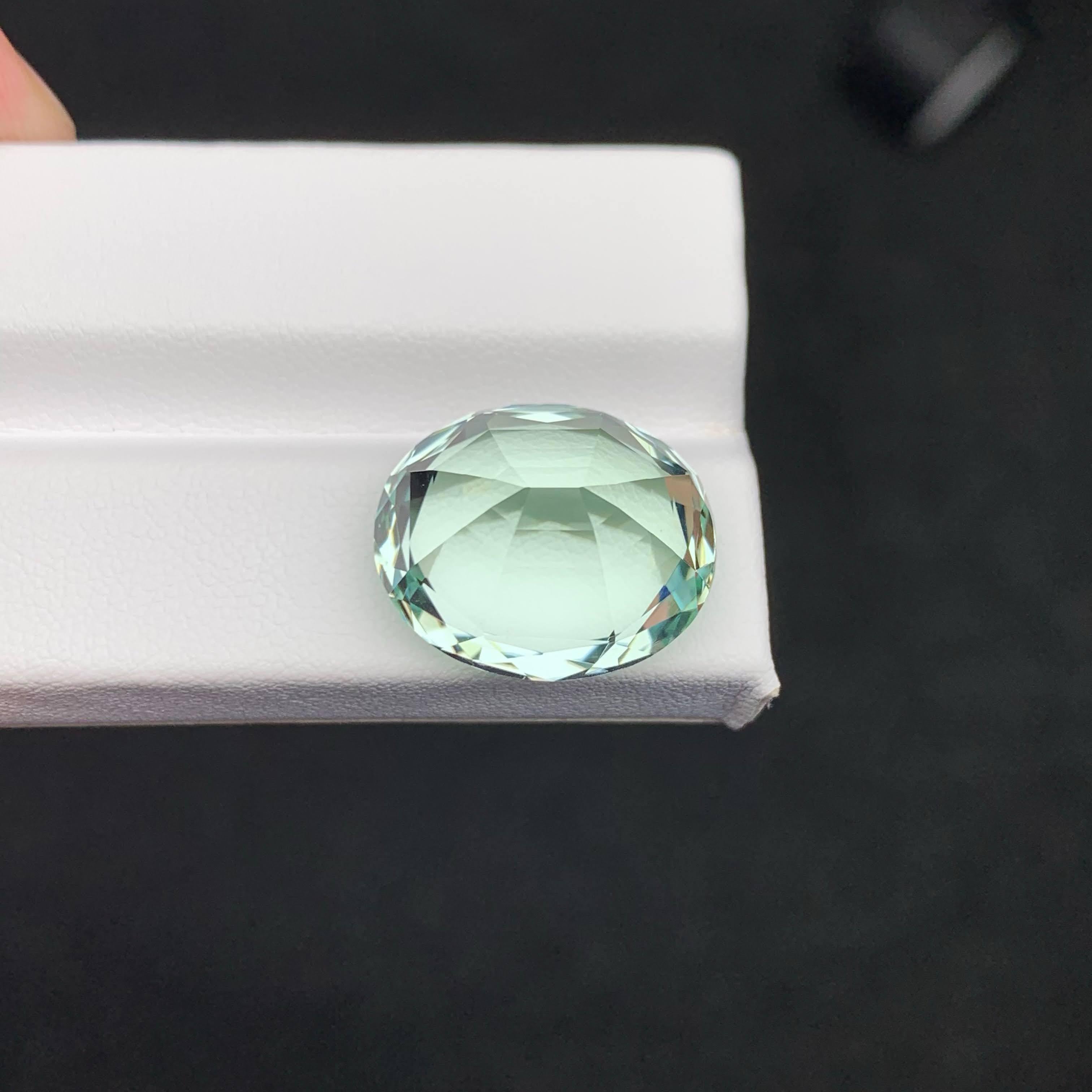 Modern 21.35 Carat Loose Mint Green Tourmaline Oval – Rare Gem for Collectors & Custom For Sale