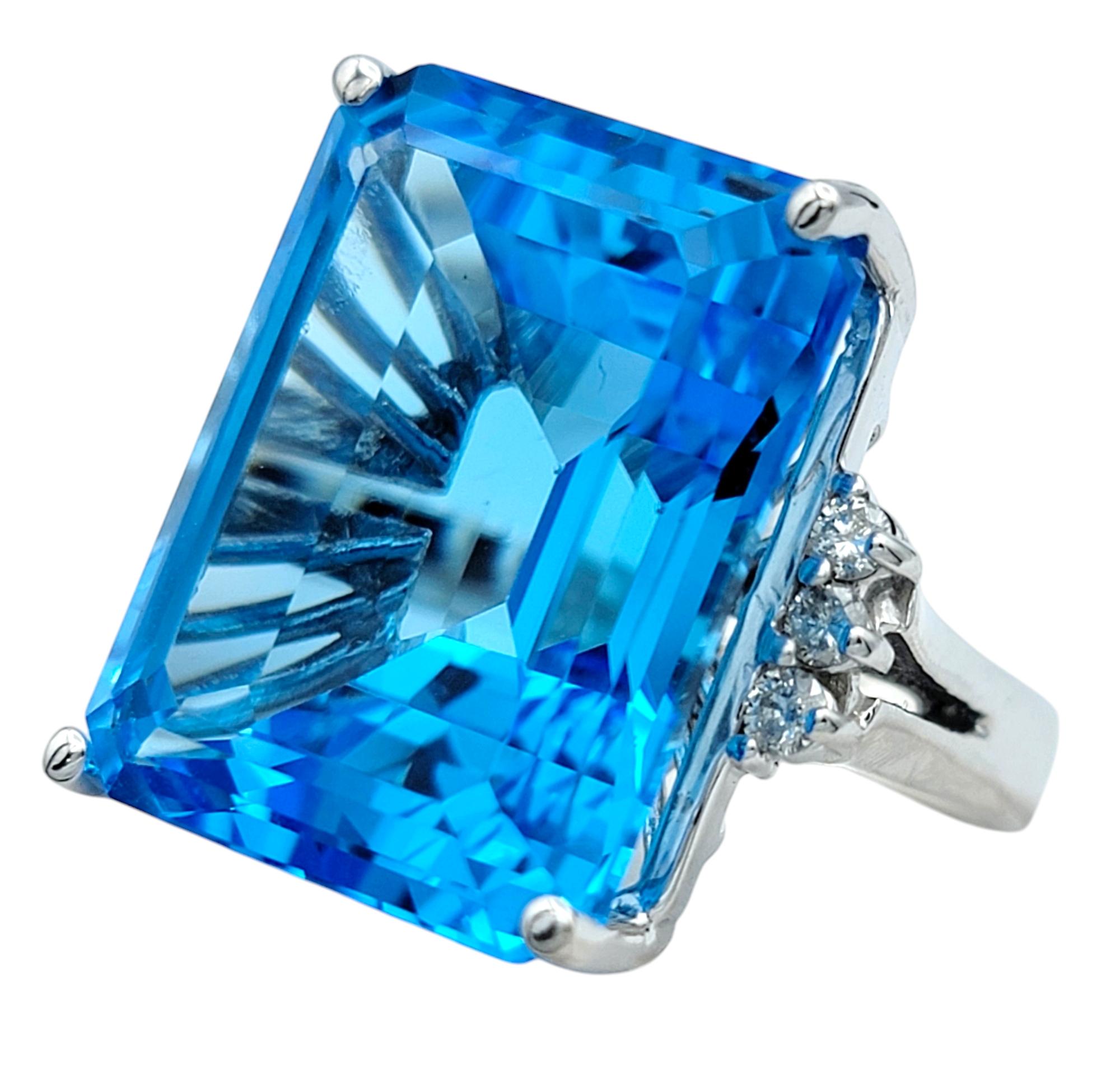 Contemporary 21.39 Carat Emerald Cut Blue Topaz Cocktail Ring With Diamonds in 14 Karat Gold For Sale