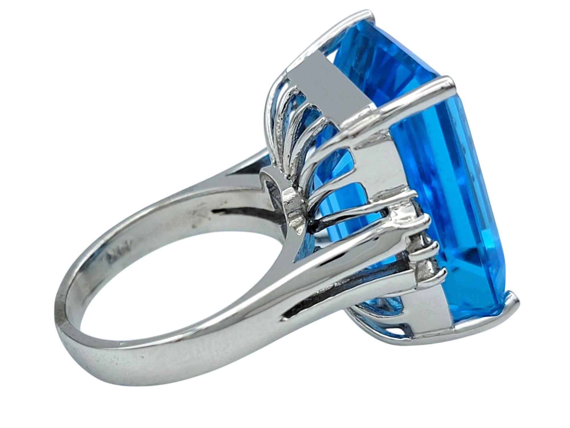 Women's 21.39 Carat Emerald Cut Blue Topaz Cocktail Ring With Diamonds in 14 Karat Gold For Sale