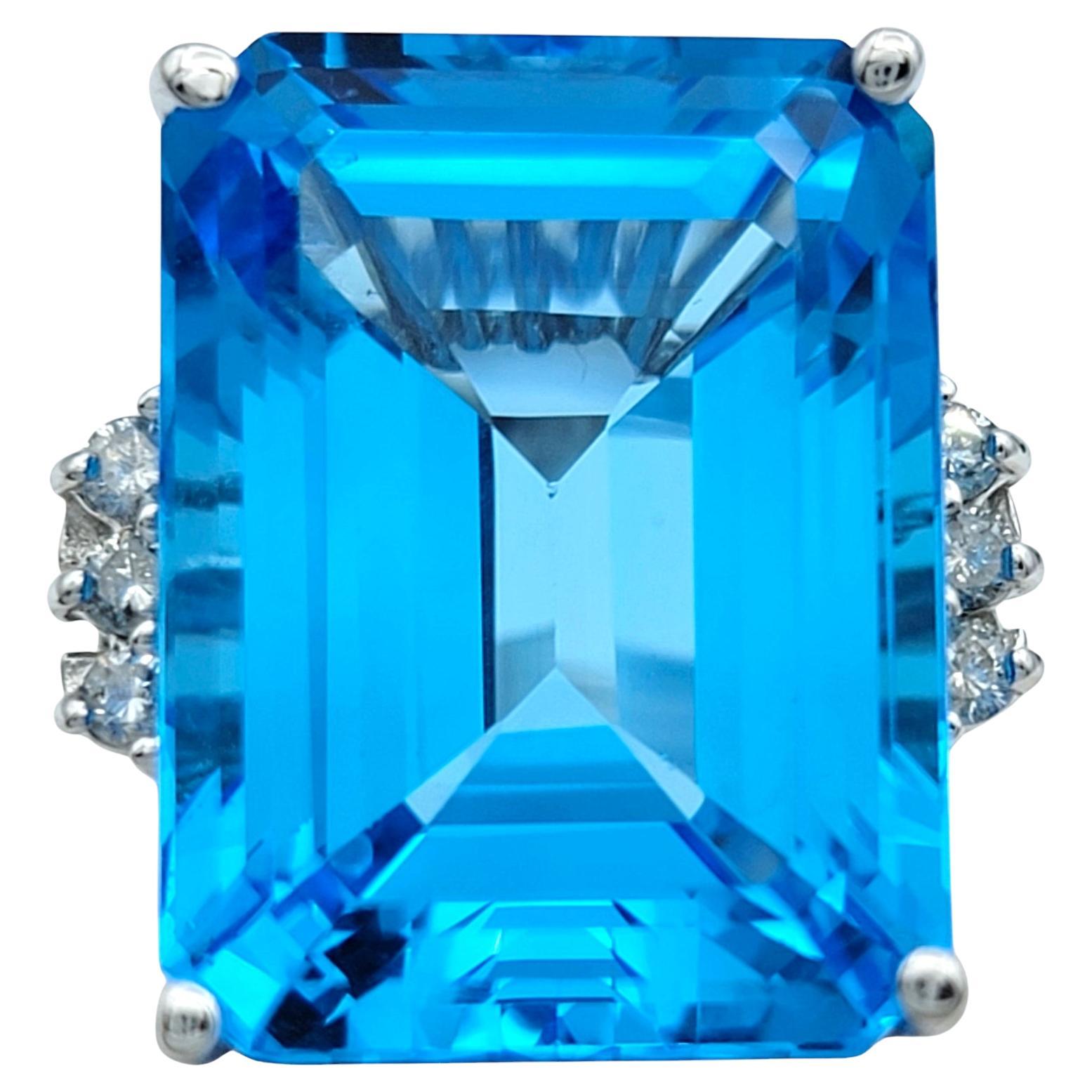 21.39 Carat Emerald Cut Blue Topaz Cocktail Ring With Diamonds in 14 Karat Gold