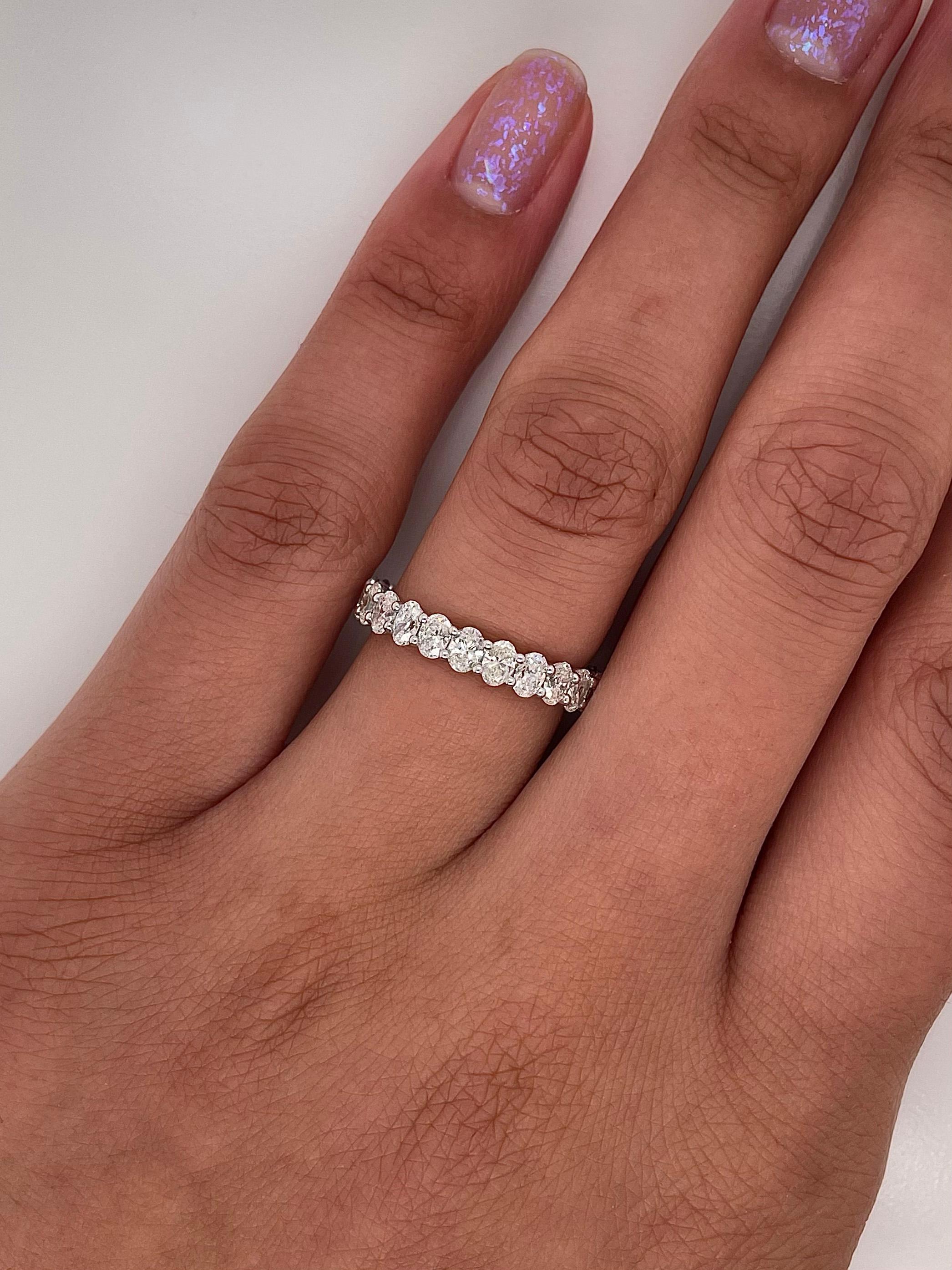 Ladies diamond Eternity band carries 2.13 total Carats of oval cut diamonds placed in platinum.

Size: 6.0
Color: G
Clarity: VS+

This shared prong style Eternity band was handmade by our jewelers in New York City.

 