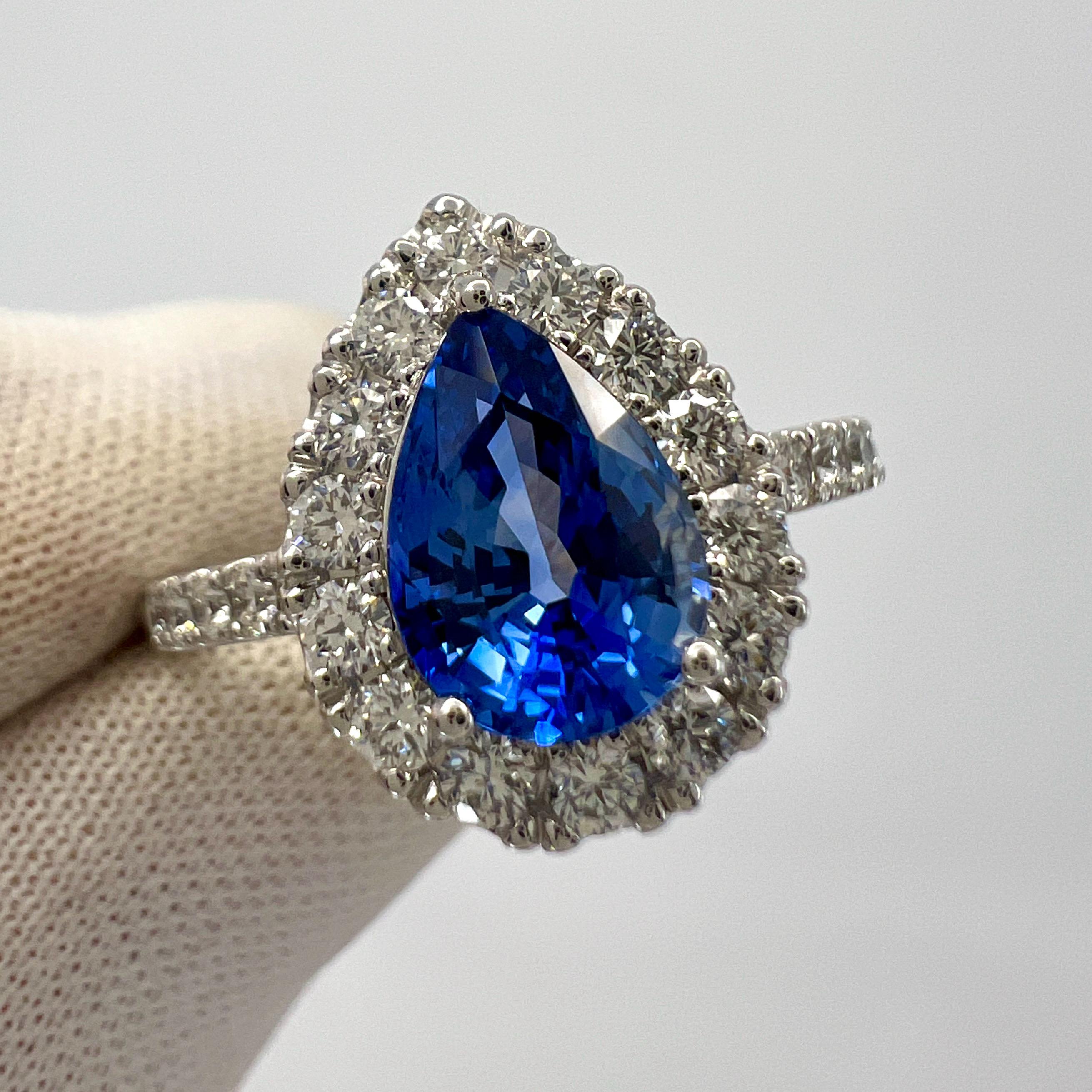 Fine Natural Pear Cut Cornflower Blue Ceylon Sapphire And Diamond 18k White Gold Halo Ring. 2.13 Carat total.

1.57 Carat centre Ceylon sapphire of the highest quality. This stone has a top grade cornflower blue colour and excellent clarity. 