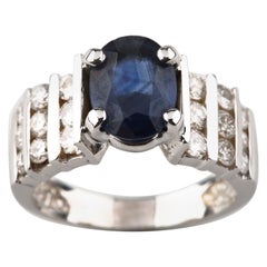 Bague solitaire en or blanc 14 carats avec saphir bleu de 2,14 carats et diamants