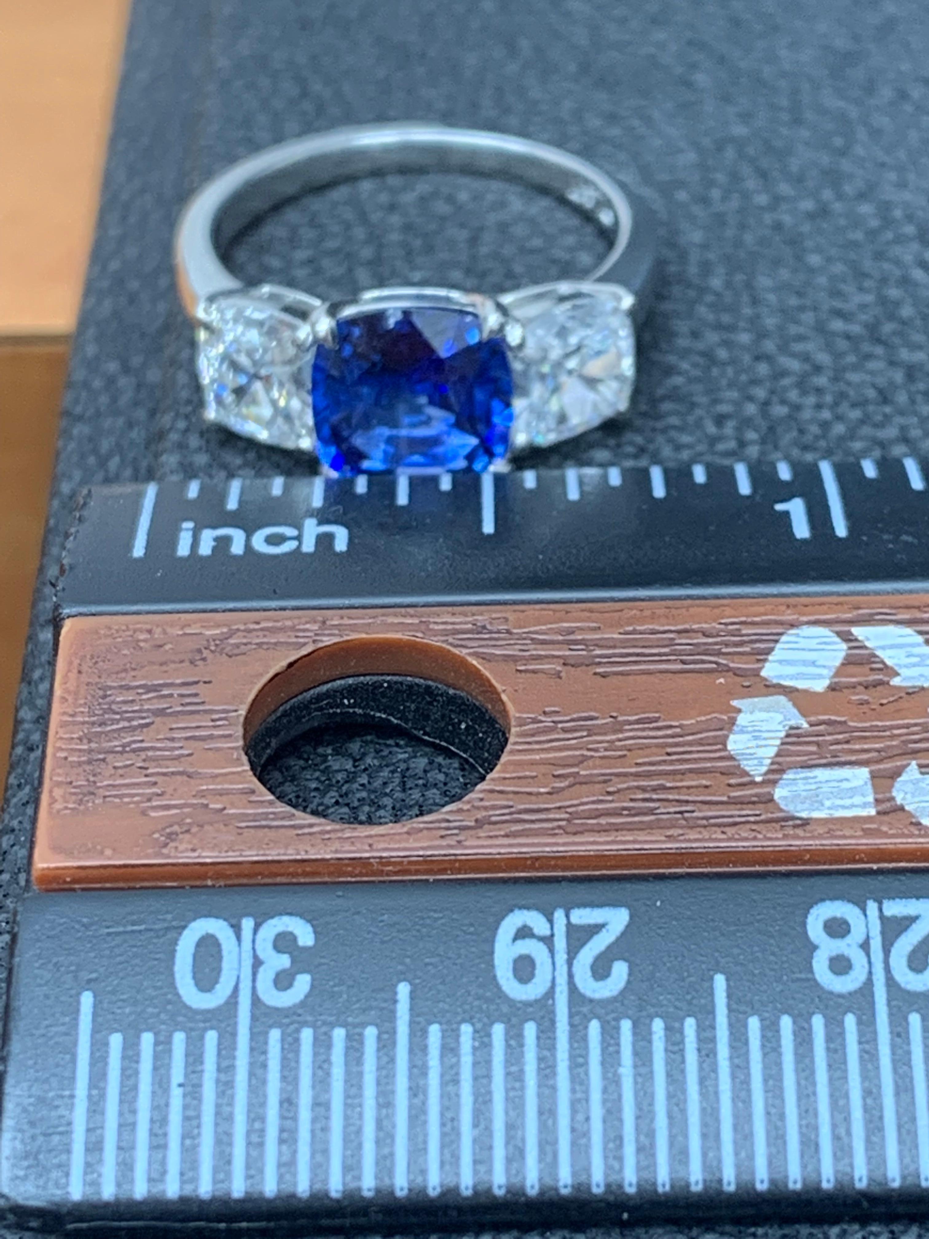 2.14 Carat Cushion Cut Sapphire and Diamond Three-Stone Engagement Platinum Ring For Sale 11