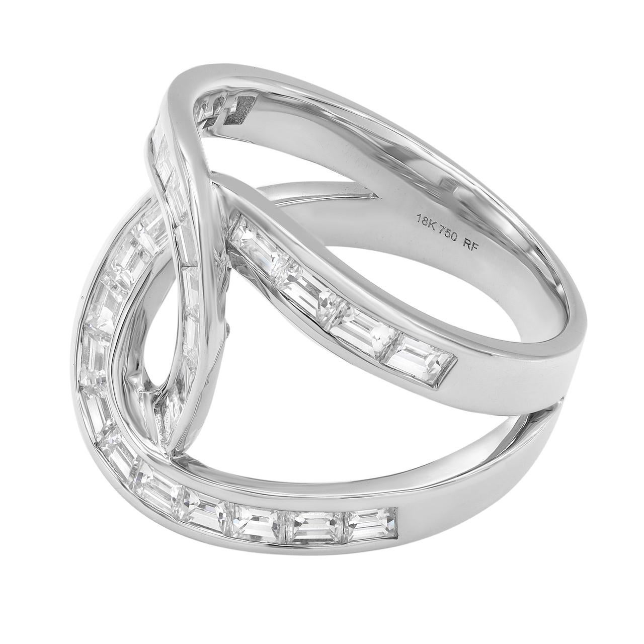 Make a bold statement with the Diamond Baguette Interwoven Statement Ring in 18K White Gold. This exquisite ring showcases the beauty of modern tapered baguettes in a mesmerizing interwoven design. Crafted with meticulous attention to detail in