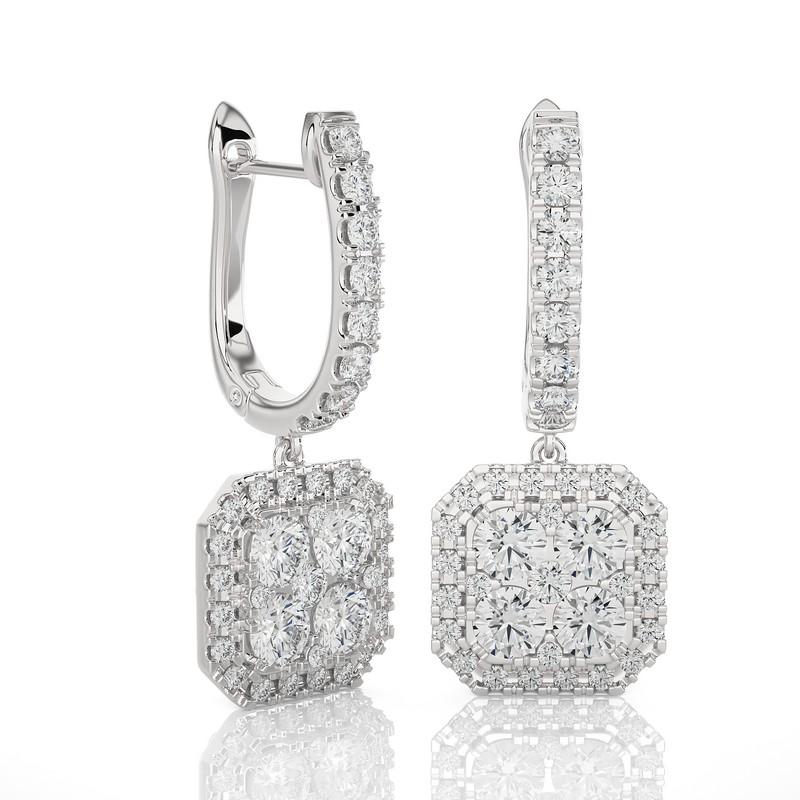 The Moonlight Cushion Cluster Lever Back Earrings are a radiant masterpiece, crafted from 4.72 grams of 14K white gold. These earrings showcase a stunning cluster of 74 excellent round diamonds, totaling 1.6 carats. The design is both elegant and