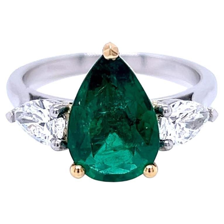 2.14 Carat Emerald and Diamond Three Stone Platinum Ring
