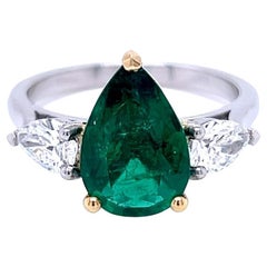 2.14 Carat Emerald and Diamond Three Stone Platinum Ring