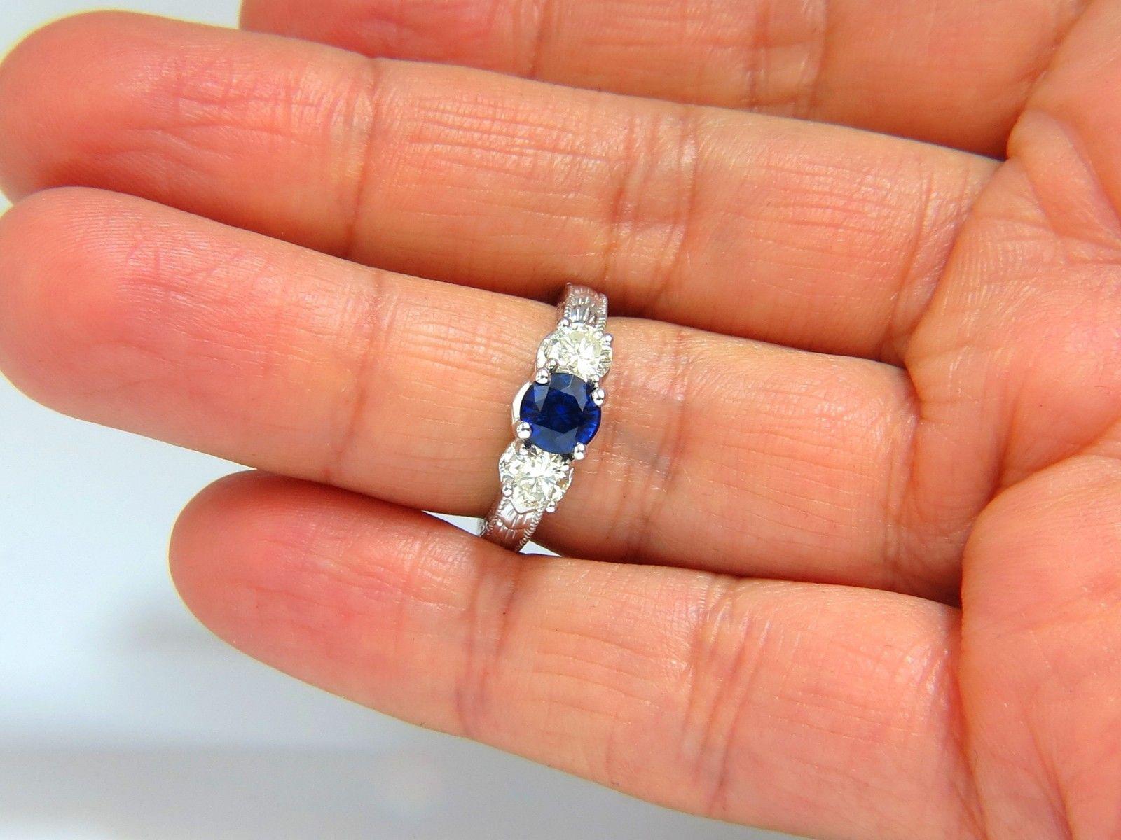 Ladies round shaped sapphire ring, three stone classic

Gorgeous Edwardian Era Gilt Deco on Shank

1.14ct. Natural Blue Sapphire

5.8mm diameter

Full cut round brilliant 

Clean Clarity & Transparent

.90ct. Diamonds.

J-color Si-1-2 clarity.

 