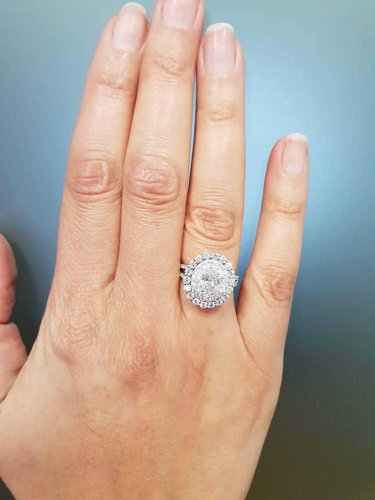 GIA Certified 2.14 Carat Oval Cut Diamond Triple Halo Engagement Ring G / VVS1 For Sale 1