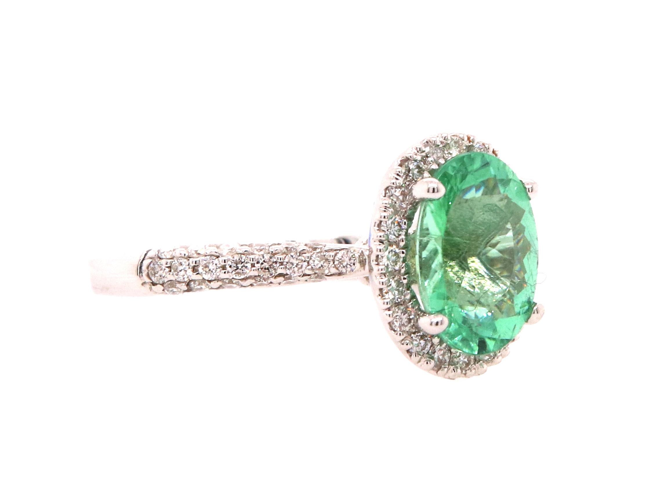 Material: 18k White Gold 
Center Stone Details: 2.14 Carat Oval Shaped Paraiba Tourmaline 
Diamond Details: 60 Round White Diamonds at Approximately 0.31 Carats - Clarity: SI / Color: H-I
Complimentary sizing on all Alberto rings

Fine one-of-a-kind