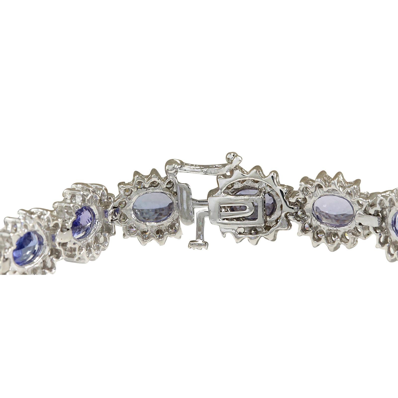 Stamped: 18K White Gold
Total Bracelet Weight: 20.3 Grams
Bracelet Length: 7.5 Inches
Bracelet Width: 10.40 mm
Gemstone Weight: Total Natural Tanzanite Weight is 13.30 Carat (Measures: 5.10x7.15 mm)
Color: Blue
Diamond Weight: Total Natural Diamond