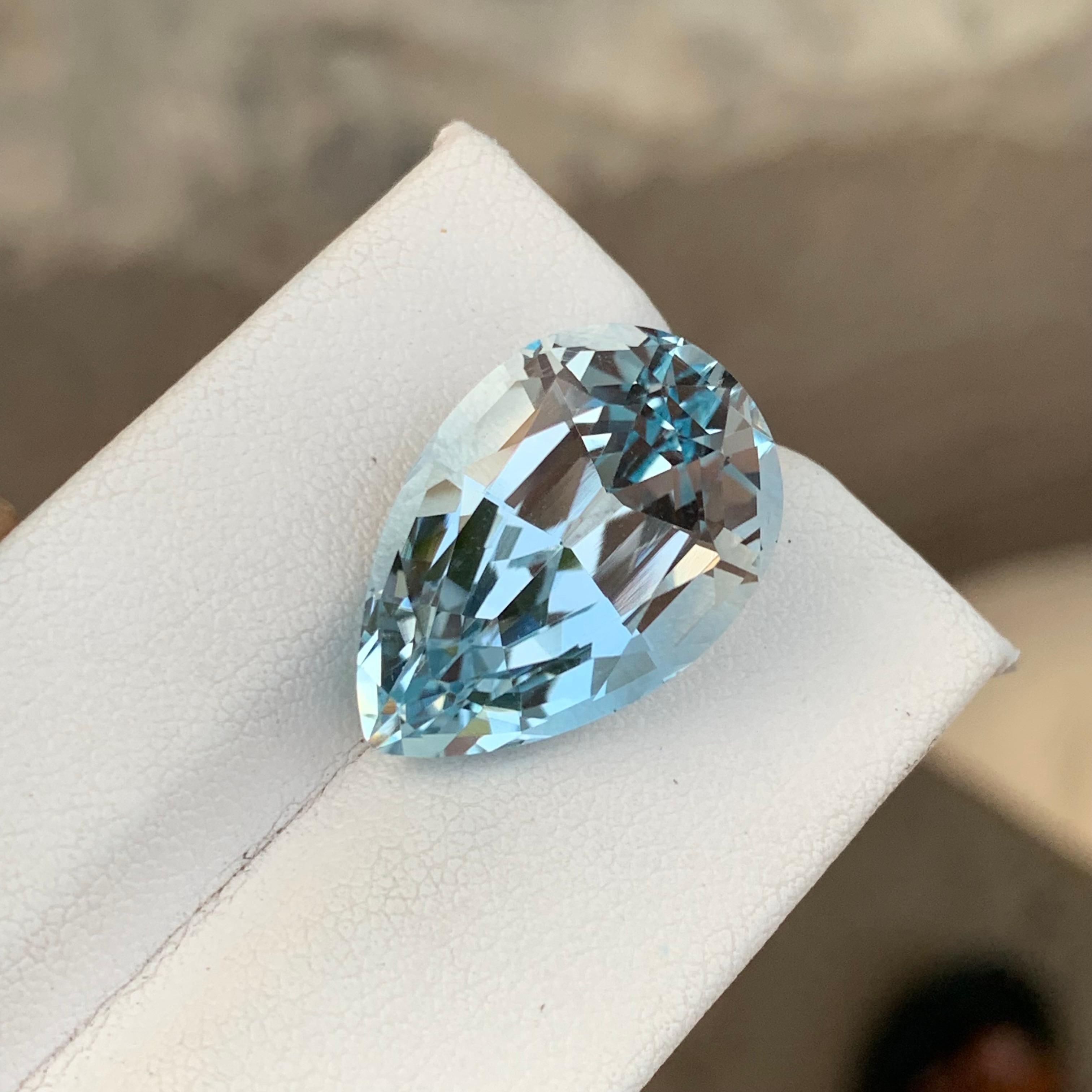 Faceted Light Blue Topaz
Weight: 21.40 Carats
Dimension: 20 x 14 x 10.5 Mm
Origin: Brazil
Color: Light Blue
Shape: Pear
Certificate: On Demand
.
Blue topaz is a mesmerizing gemstone that showcases a captivating blue hue reminiscent of clear blue