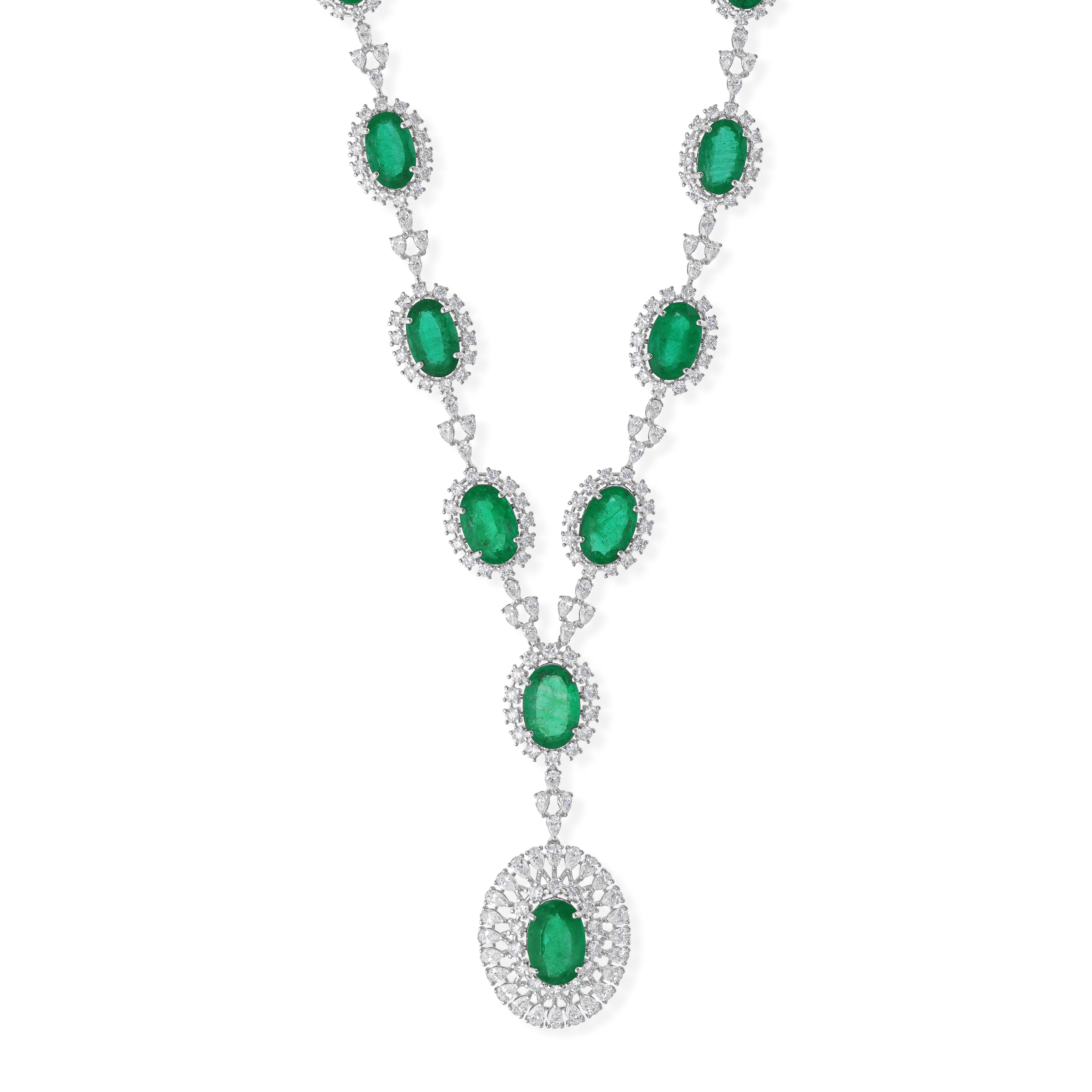Cast from 14-karat gold, these exquisite necklace is handset with 21.48 carats Zambian emerald and 7.14 carats of sparkling diamonds.

FOLLOW SPECTRUM JEWELS storefront to view the latest collection & exclusive pieces. Spectrum Jewels is proudly